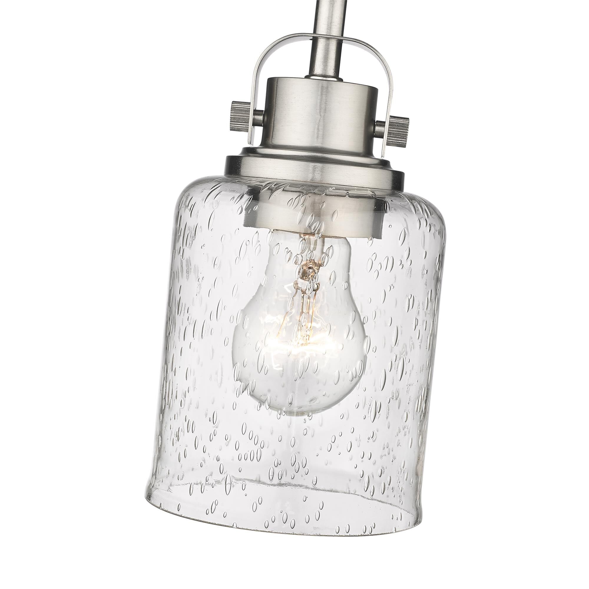 Shown in Brushed Nickel finish and Glass shade
