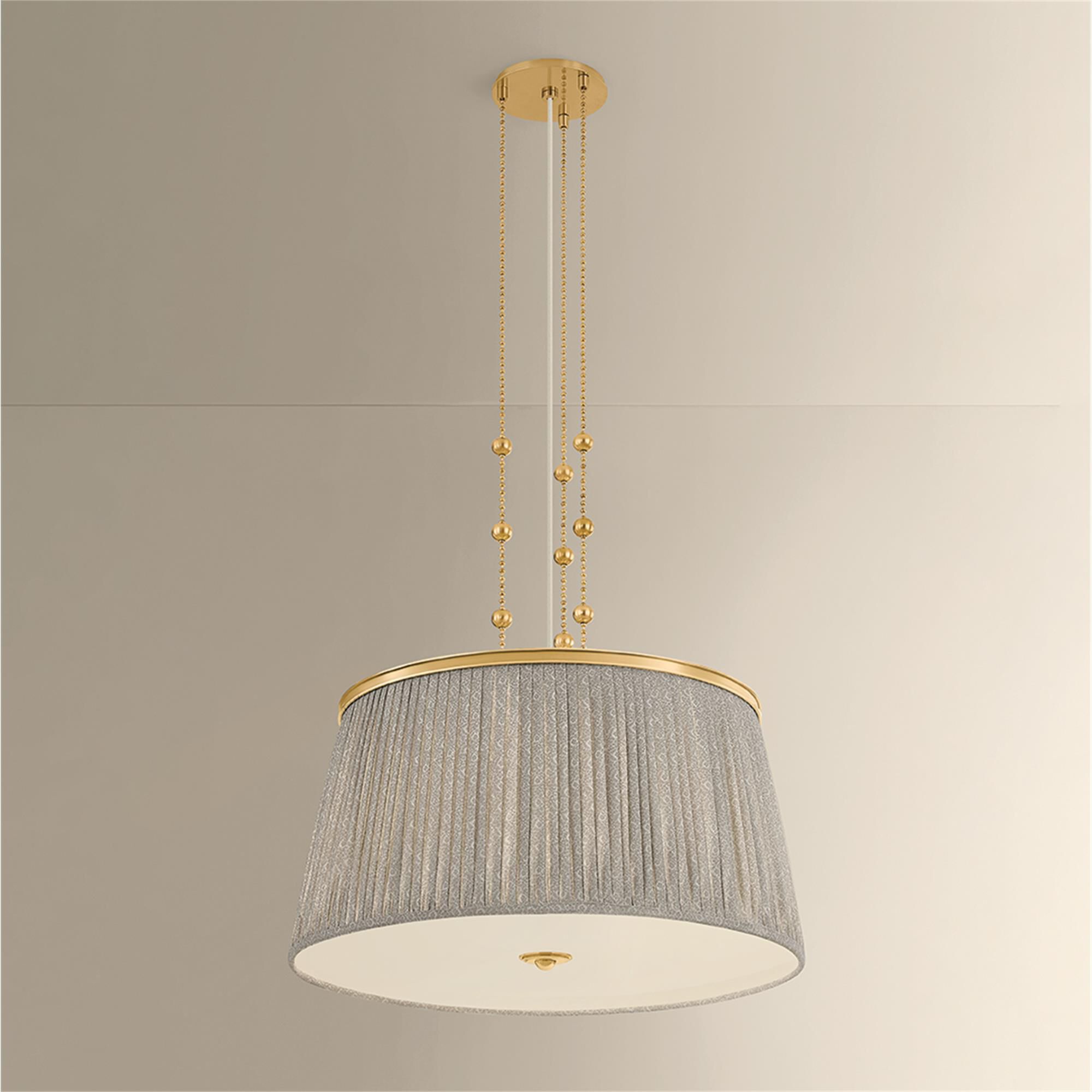 Shown in Aged Brass finish and Gathered Printed Cotton shade