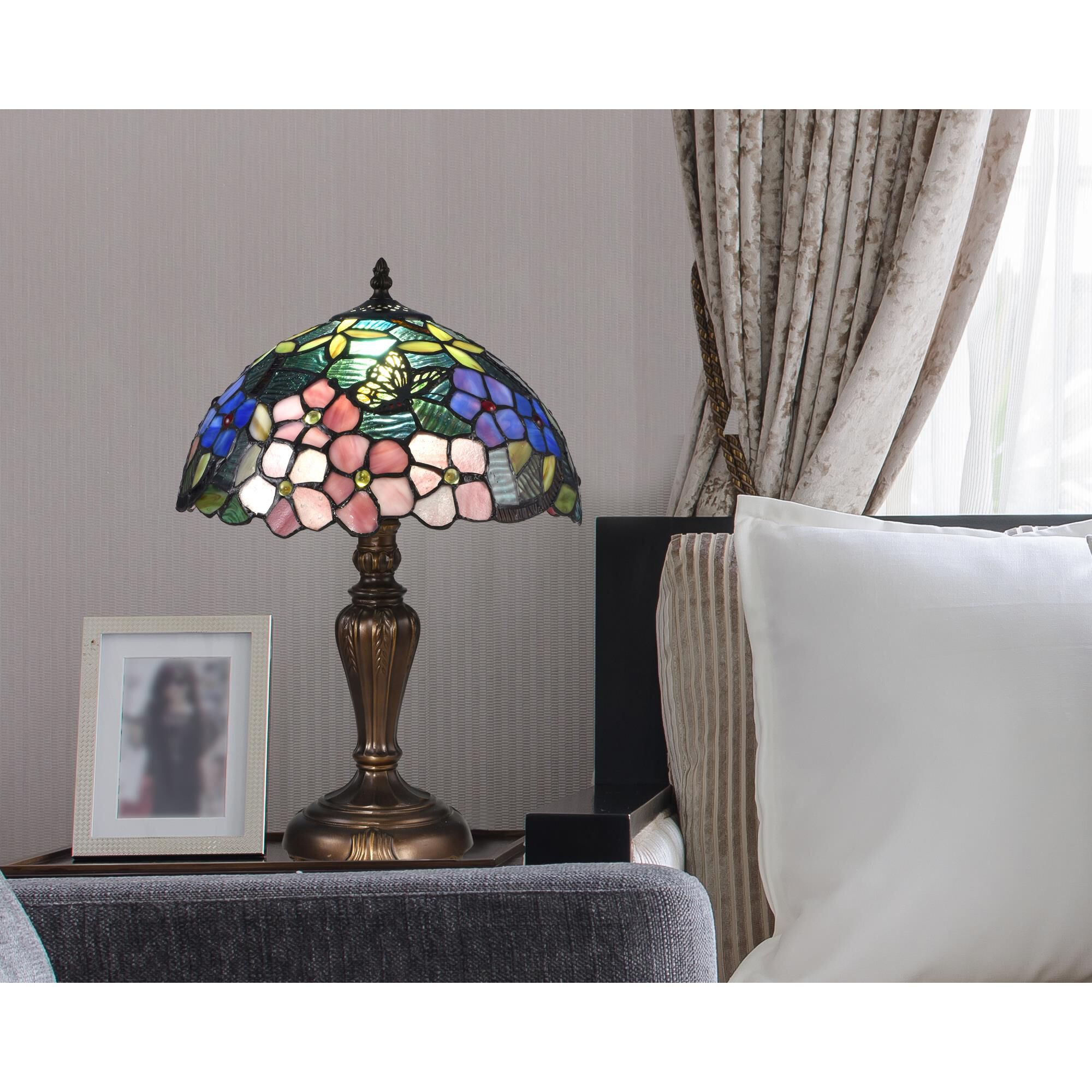 Shown in Antique Bronze finish and Hand Rolled Art (Tiffany) glass