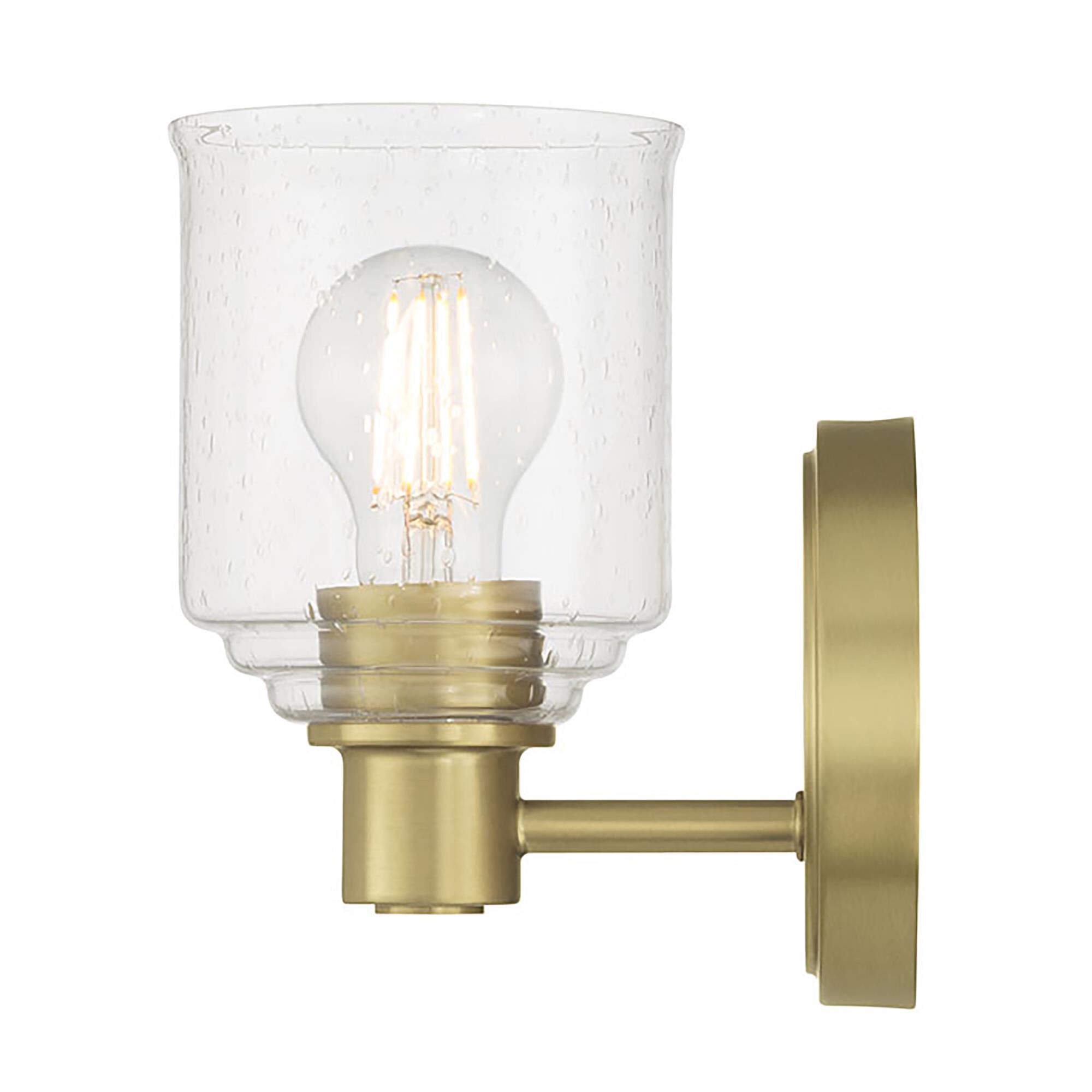 Shown in Vintage Brass finish and Clear Seeded glass