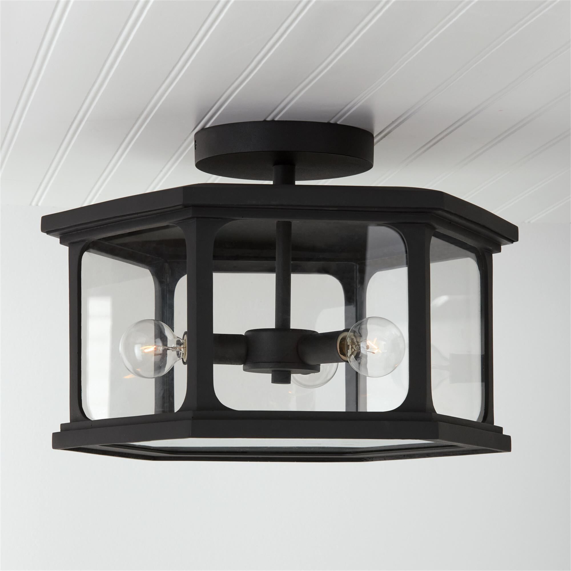 Shown in Black finish and Clear glass