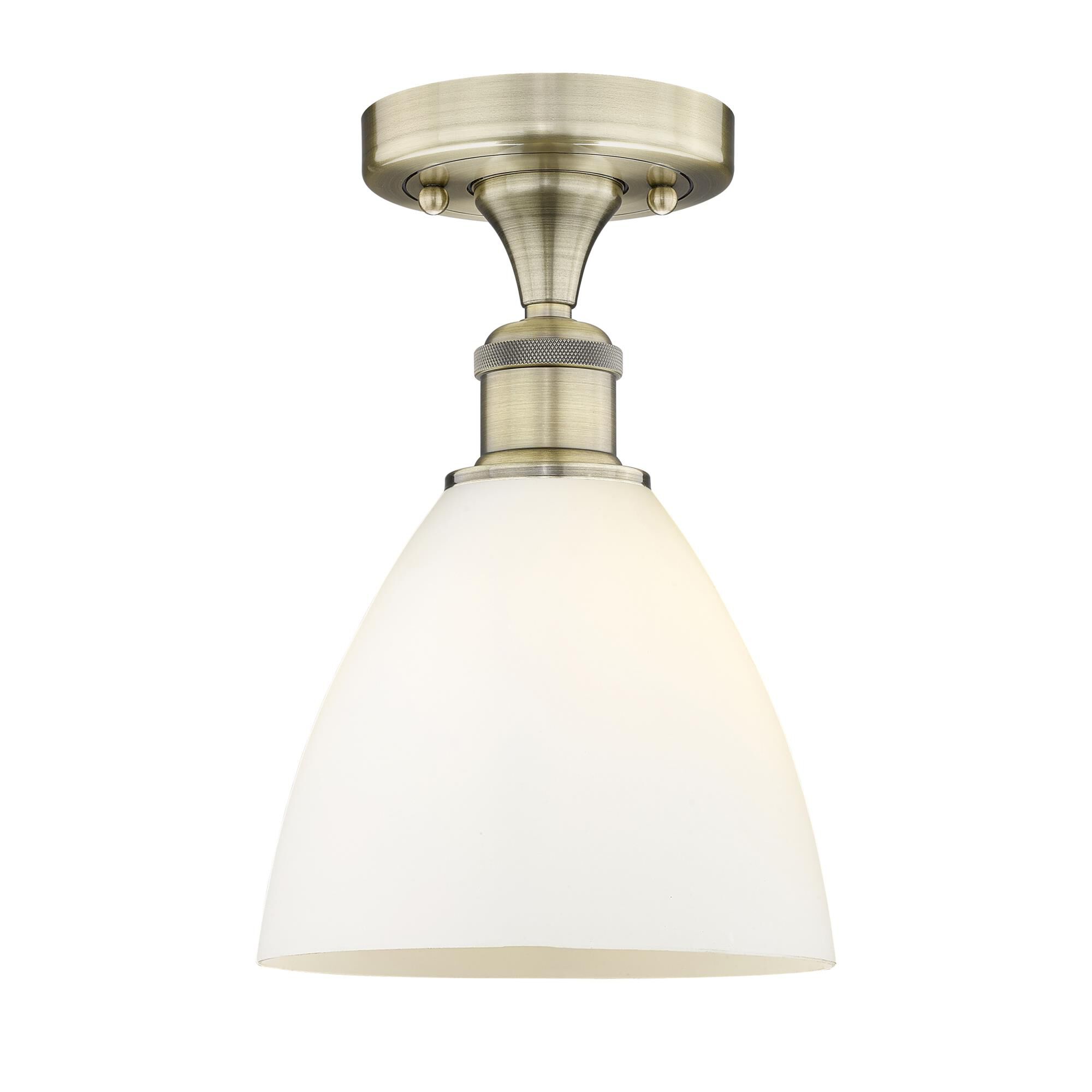 Shown in Antique Brass finish and Matte White glass