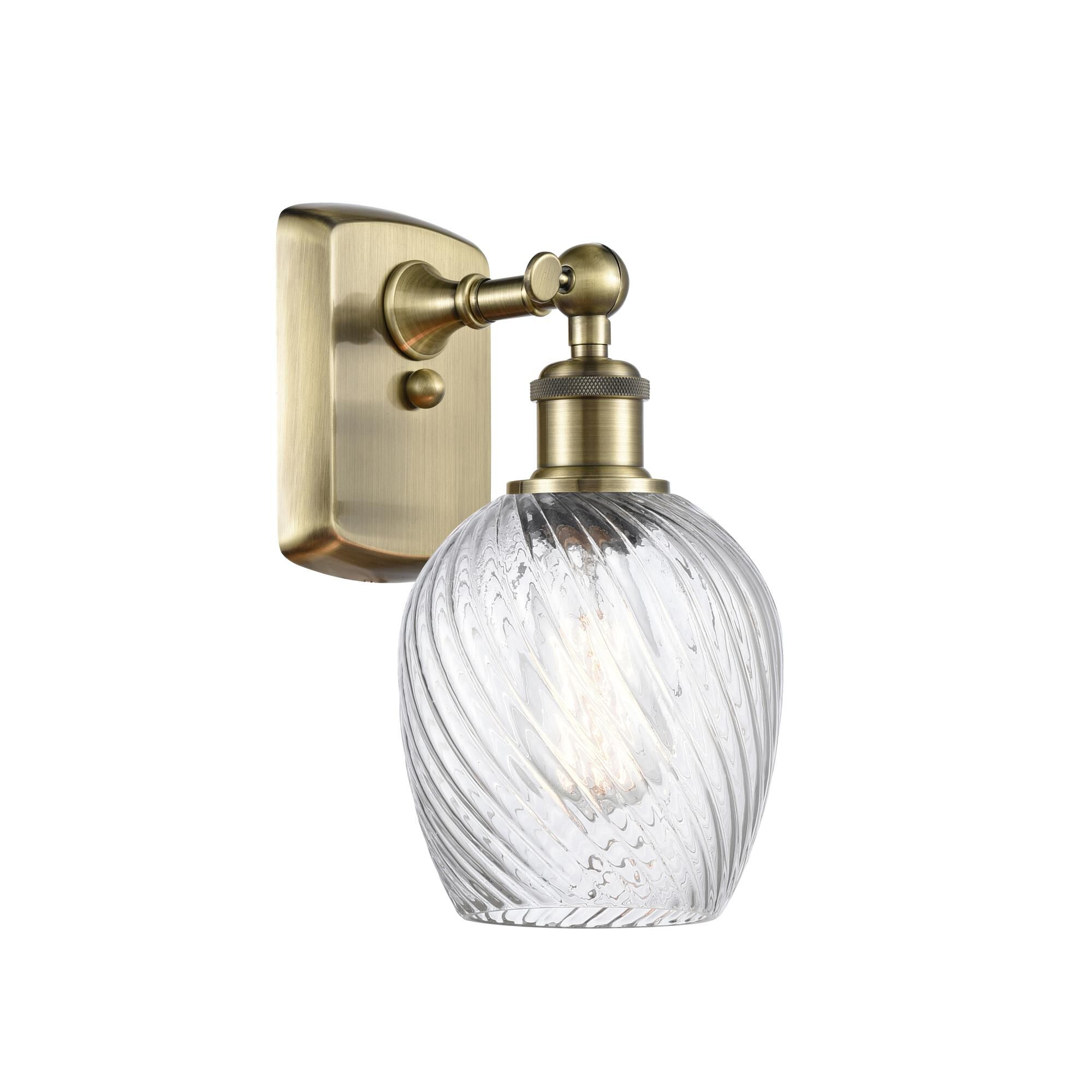 Shown in Antique Brass finish and Globe glass and Glass shade