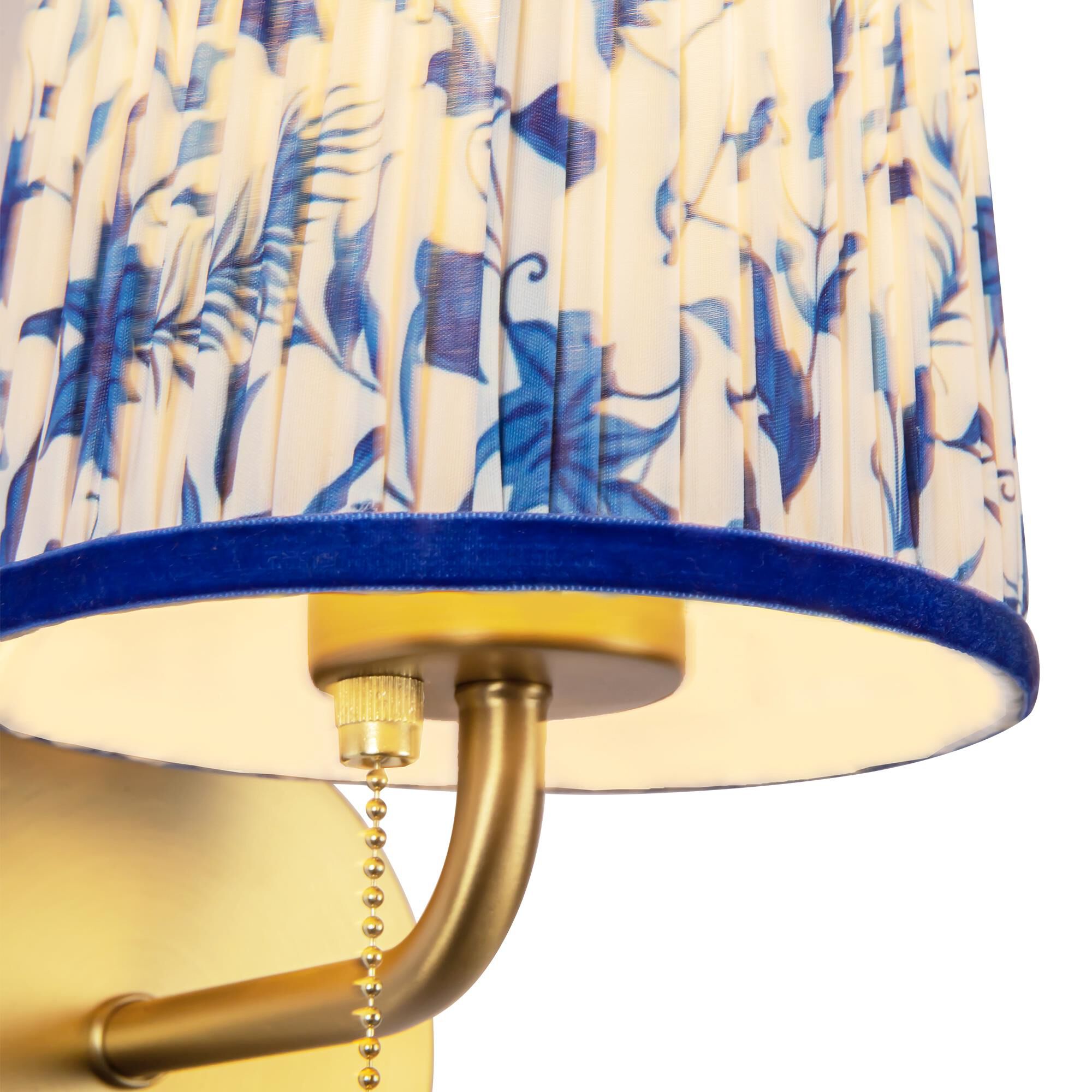 Shown in Brushed Gold finish and Blue Linen shade