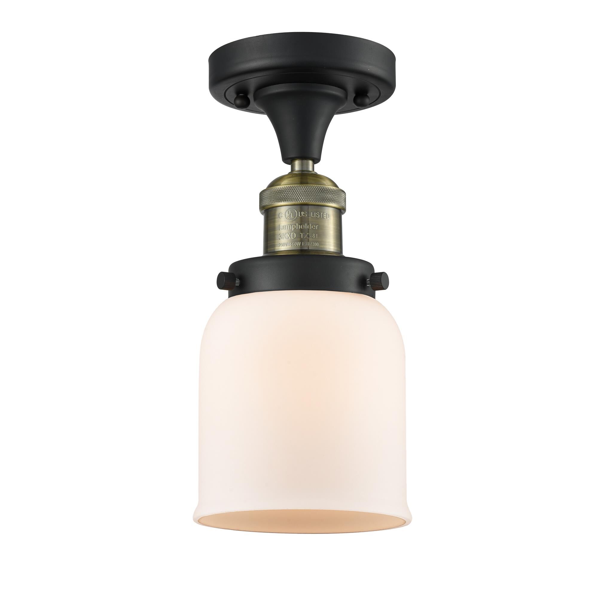 Shown in Black Antique Brass finish and Matte White Cased glass