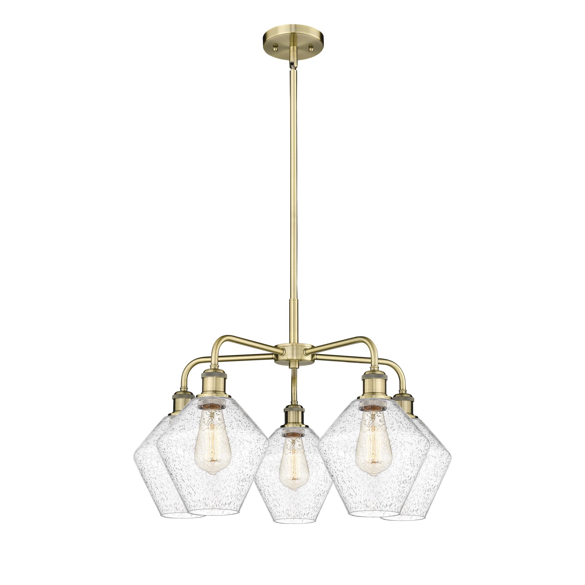 Shown in Antique Brass finish and Seedy glass