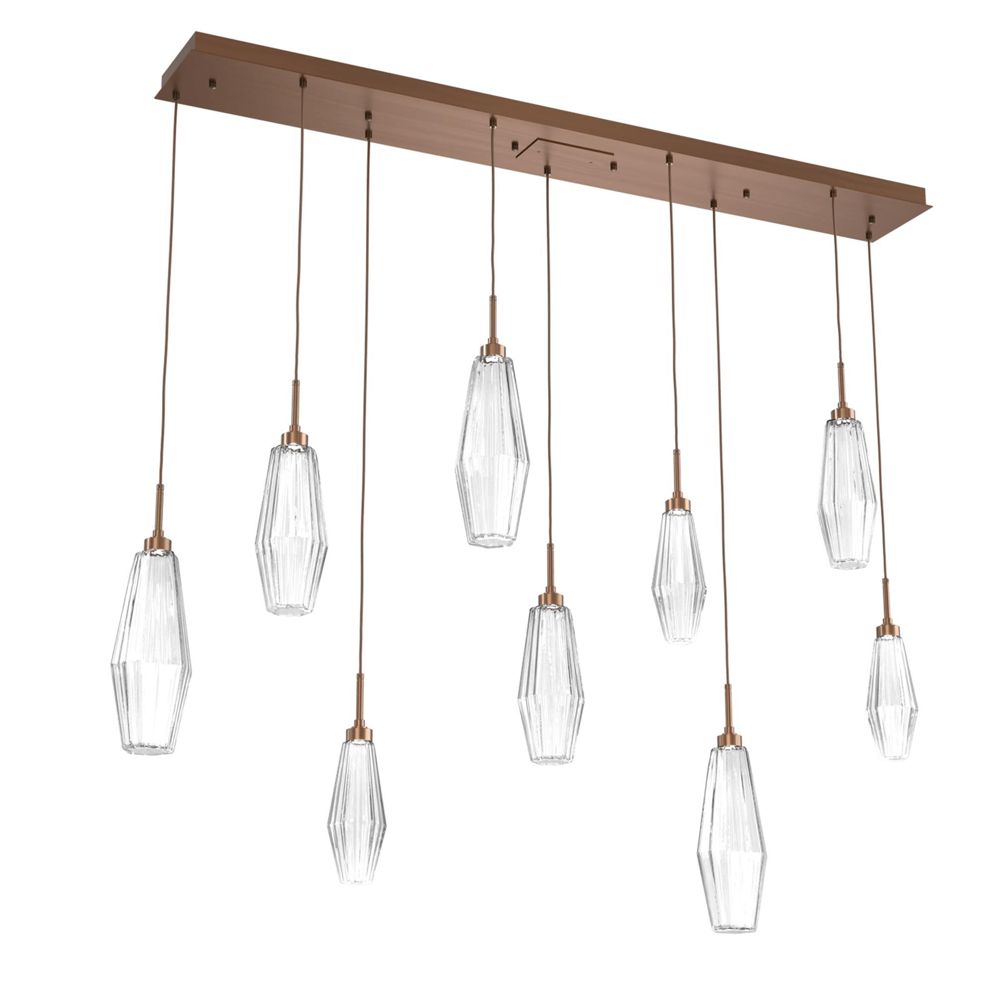 Shown in Burnished Brass finish and Optic Rib Clear glass