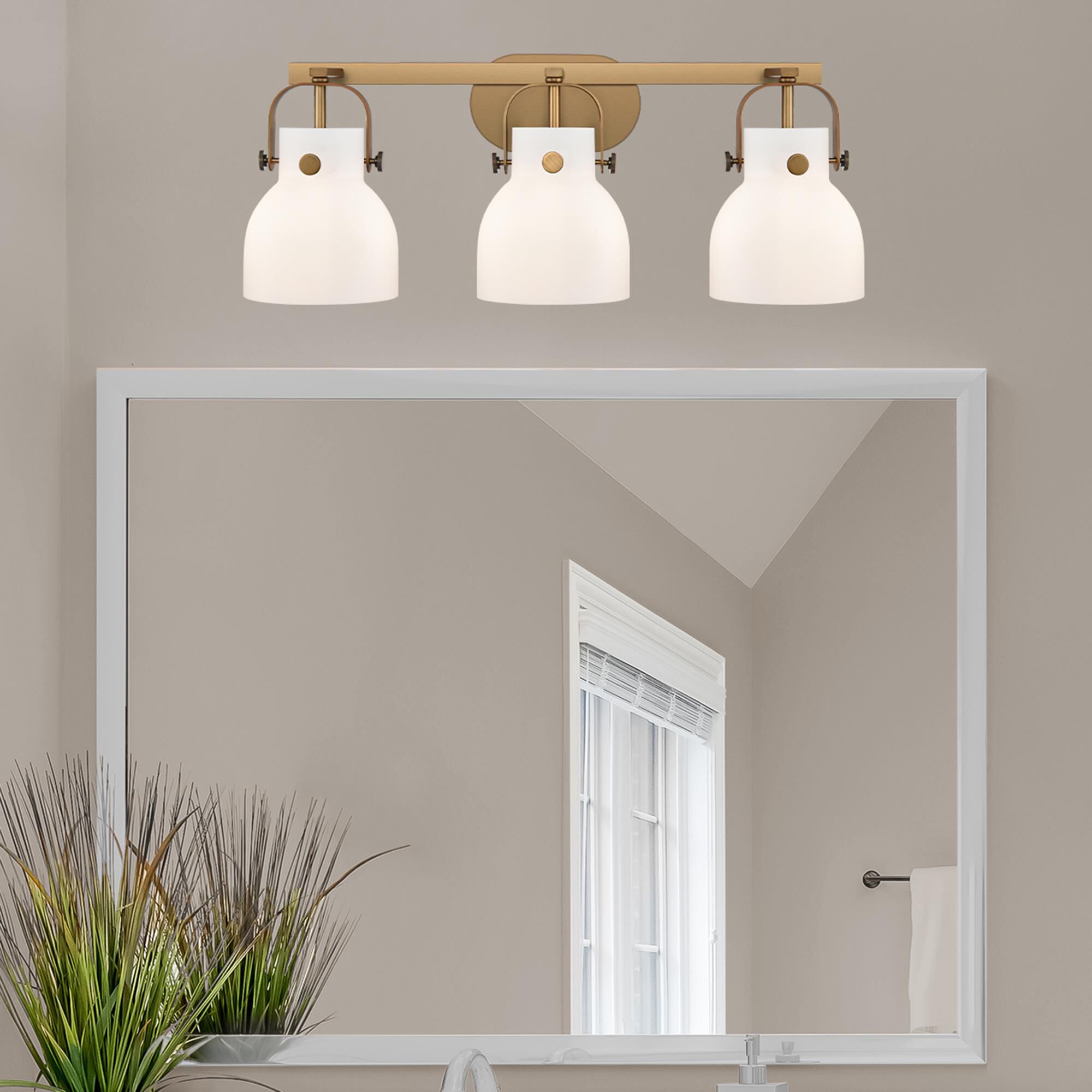 Shown in Brushed Brass finish and Matte White glass