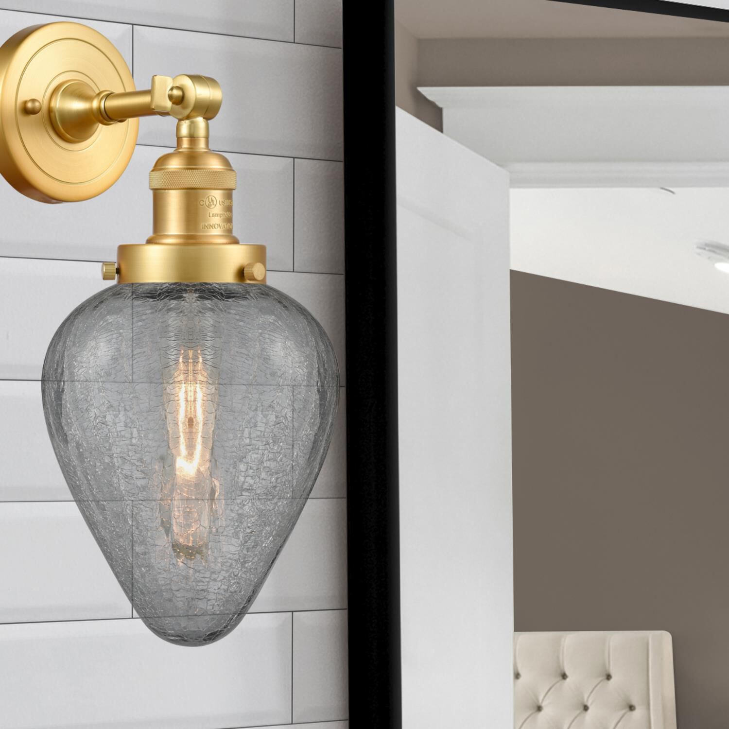 Shown in Satin Gold finish and Clear Crackle Geneseo glass