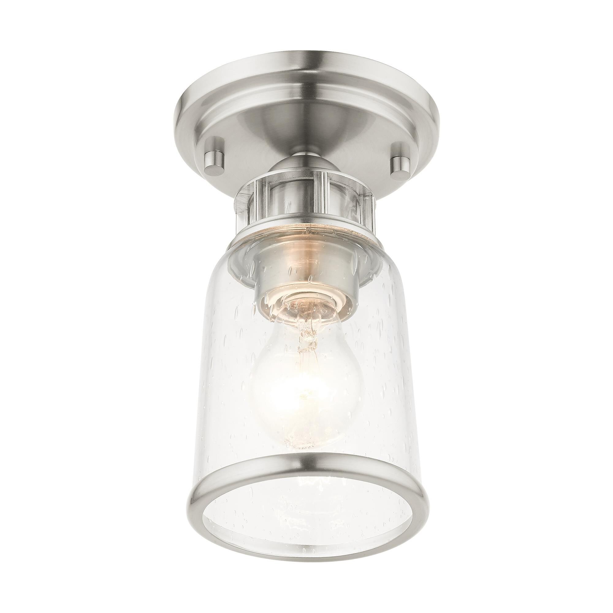 Shown in Brushed Nickel finish and Hand Blown Clear Seeded glass