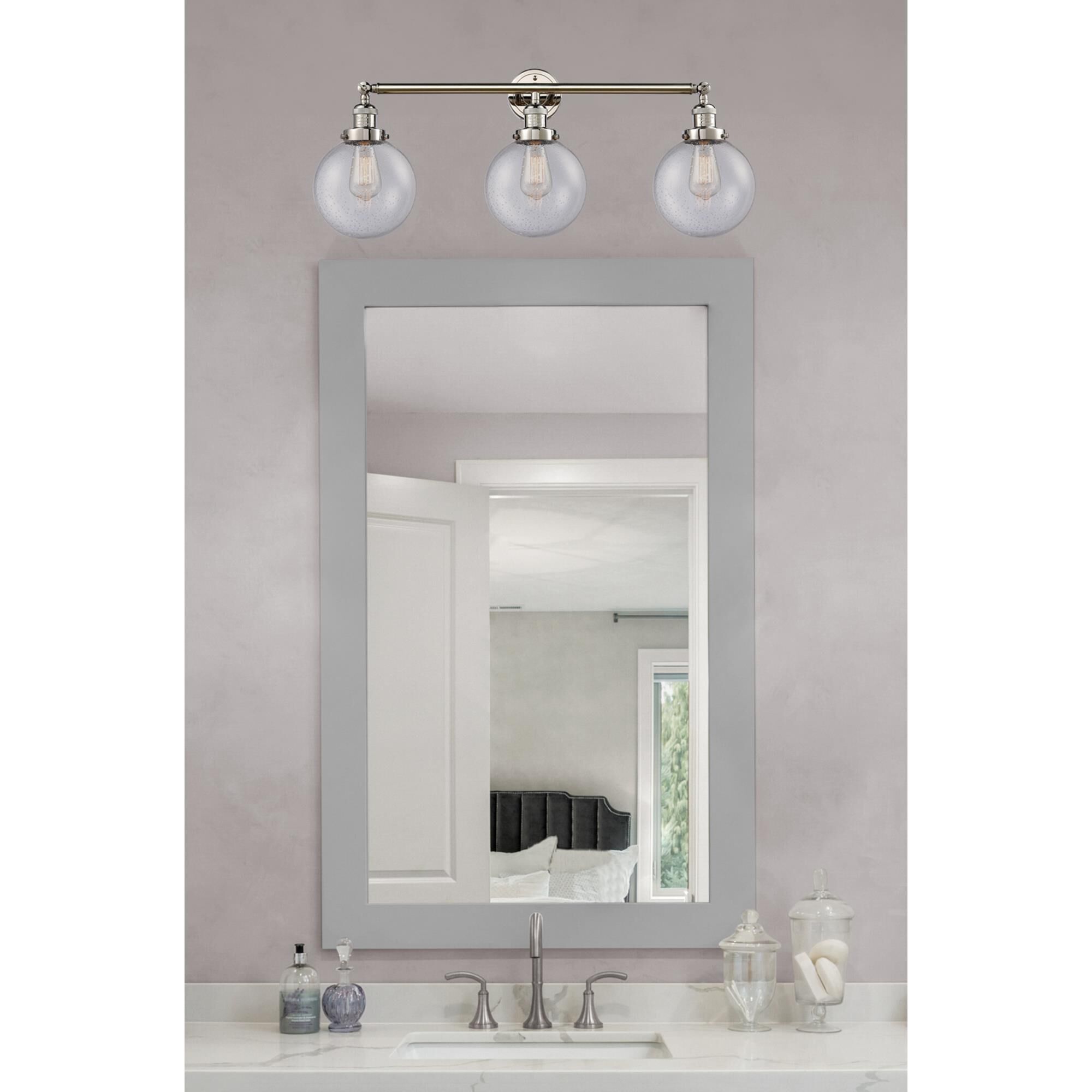 Shown in Polished Nickel finish and Seedy Beacon glass