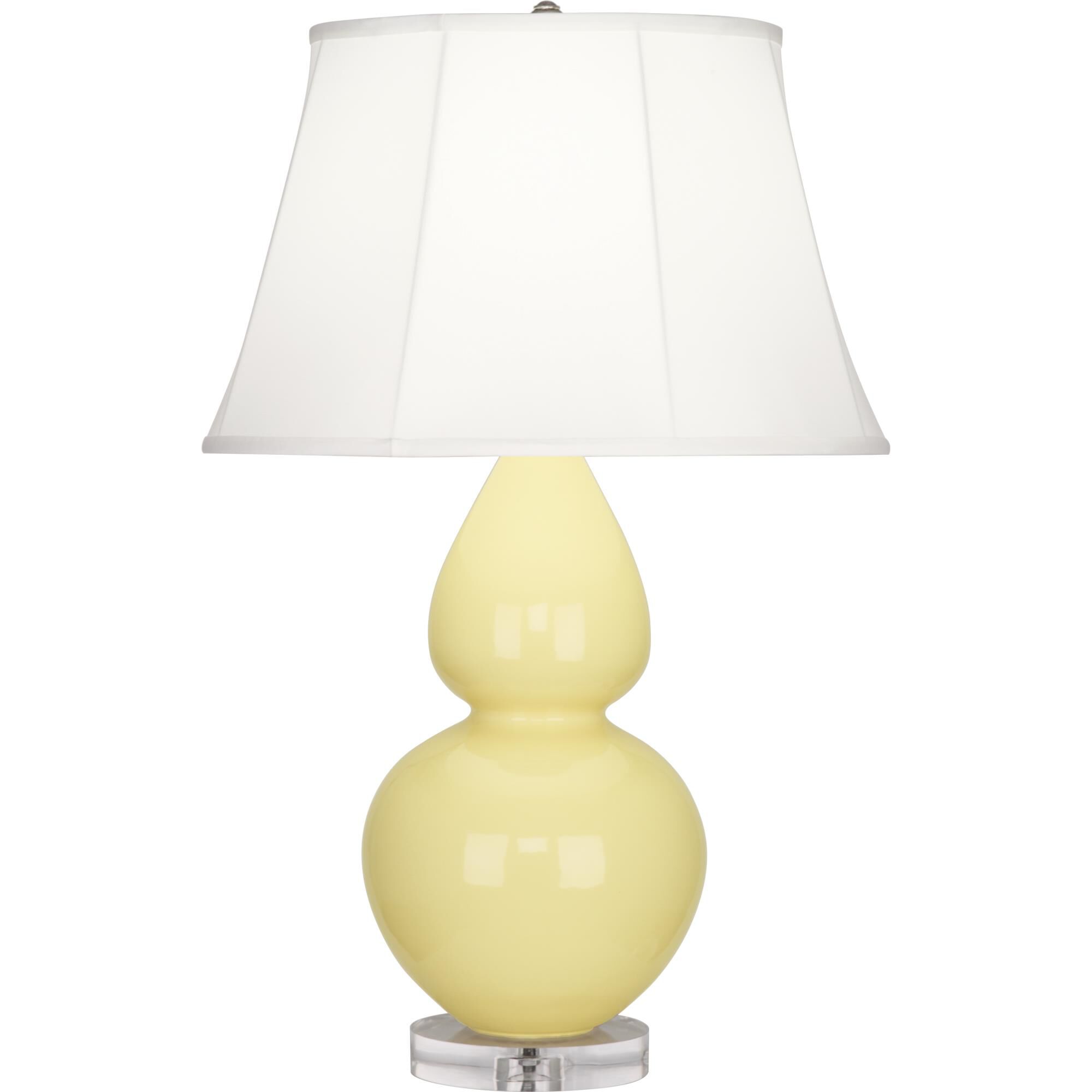 Shown in Butter Glazed Ceramic With Lucite Base finish and Ivory Stretched Fabric shade