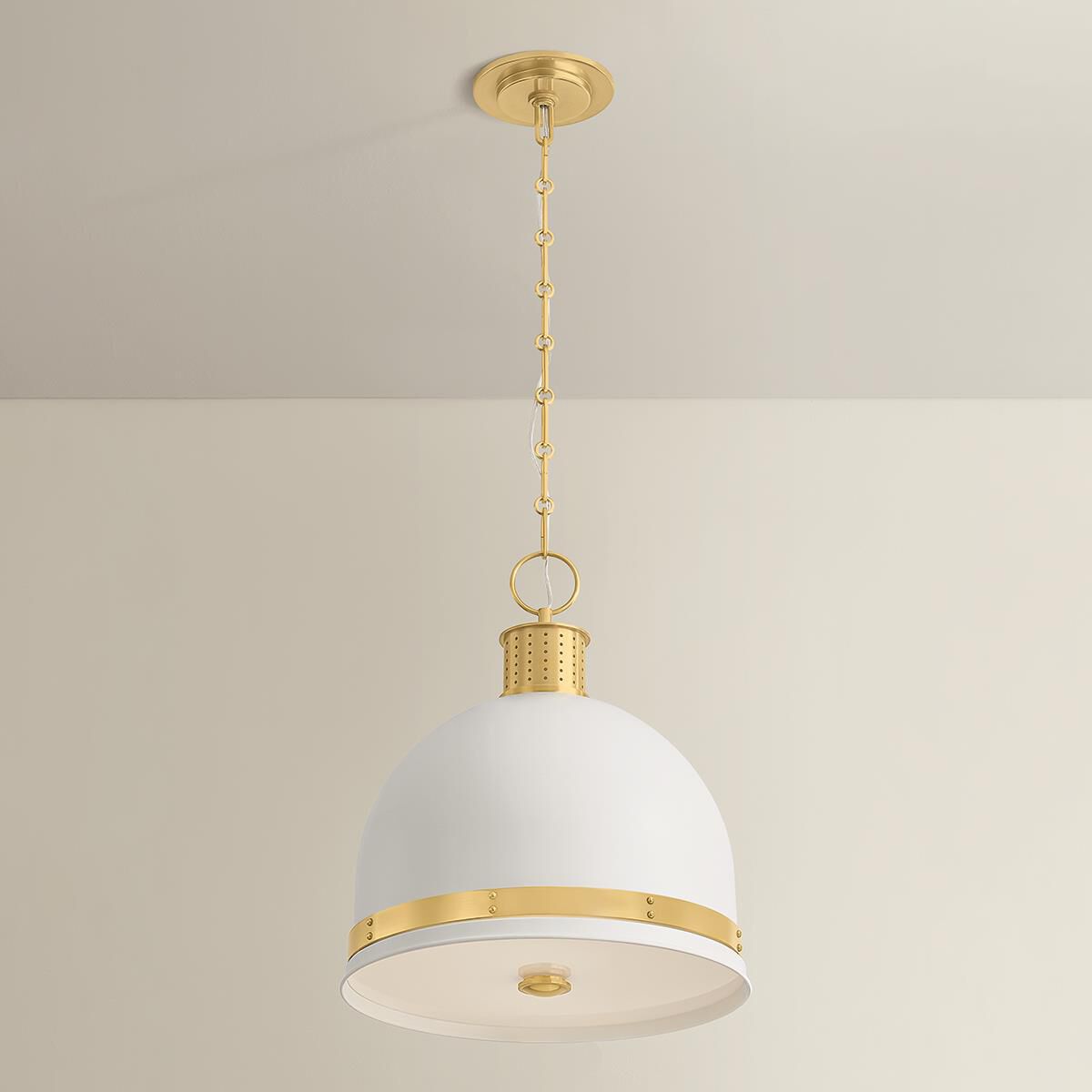 Shown in Aged Brass and Soft White finish and White glass