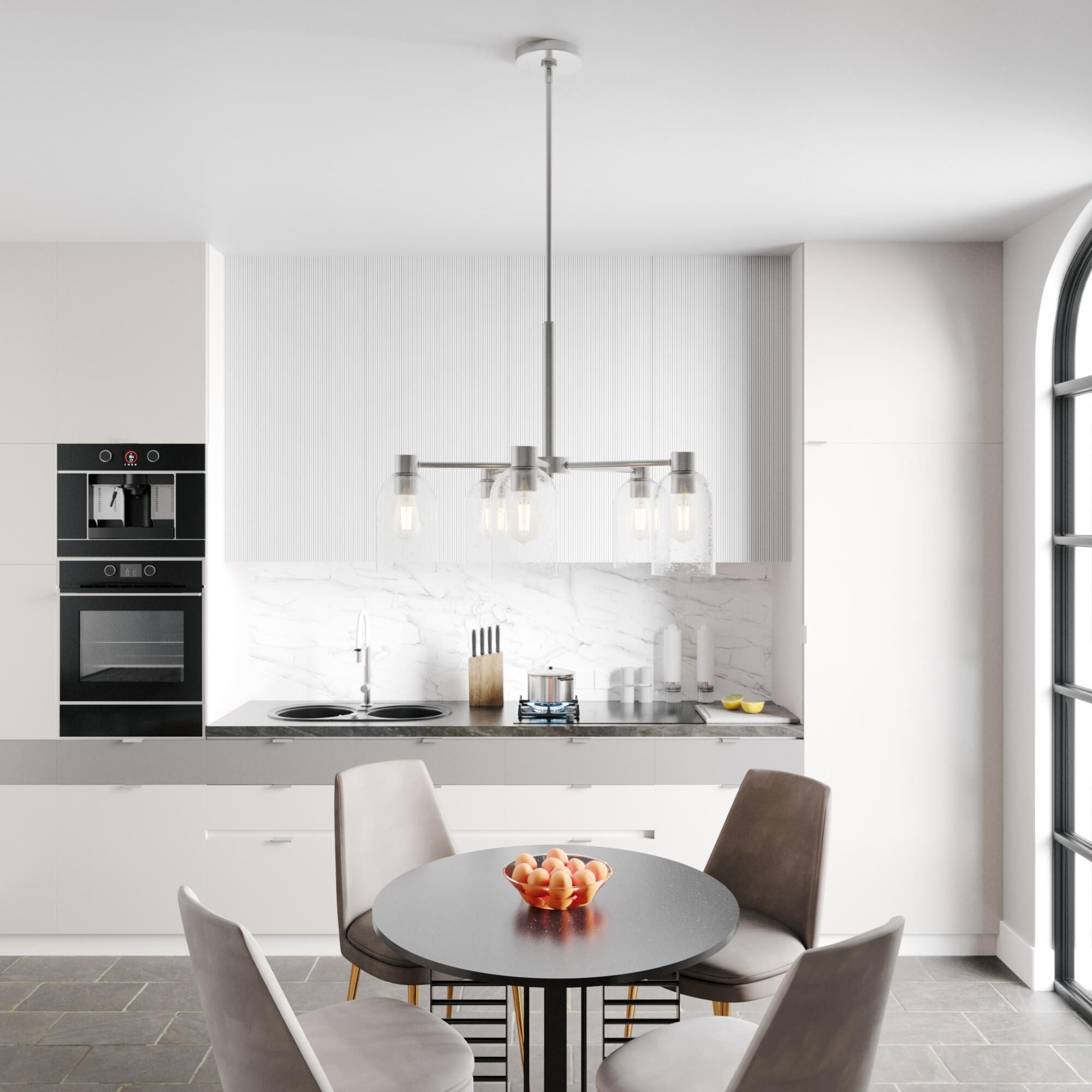 Shown in Brushed Nickel finish and Clear Seeded glass