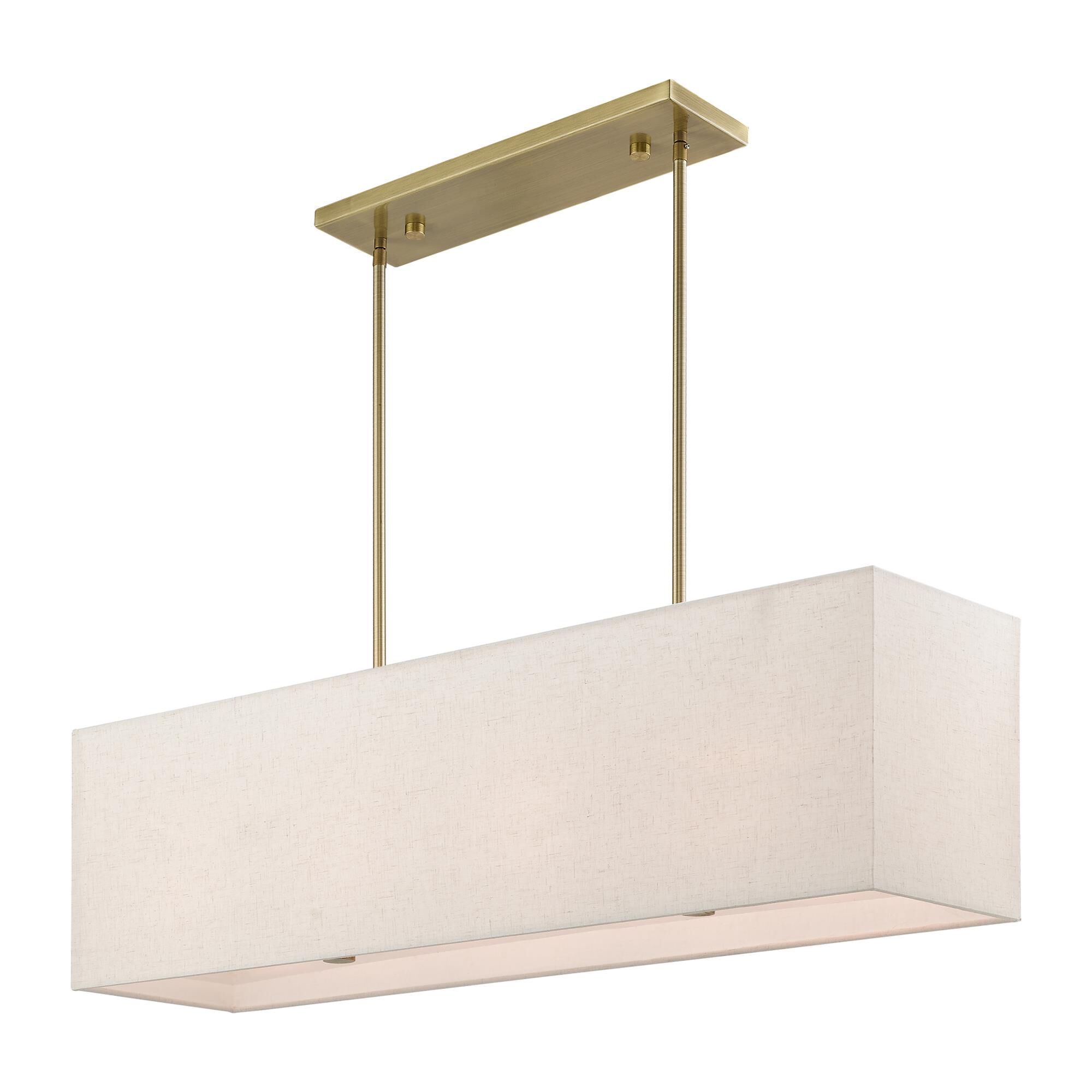 Shown in Antique Brass finish and Hand Crafted Oatmeal Color Hardback Fabric With White Fabric Inside shade