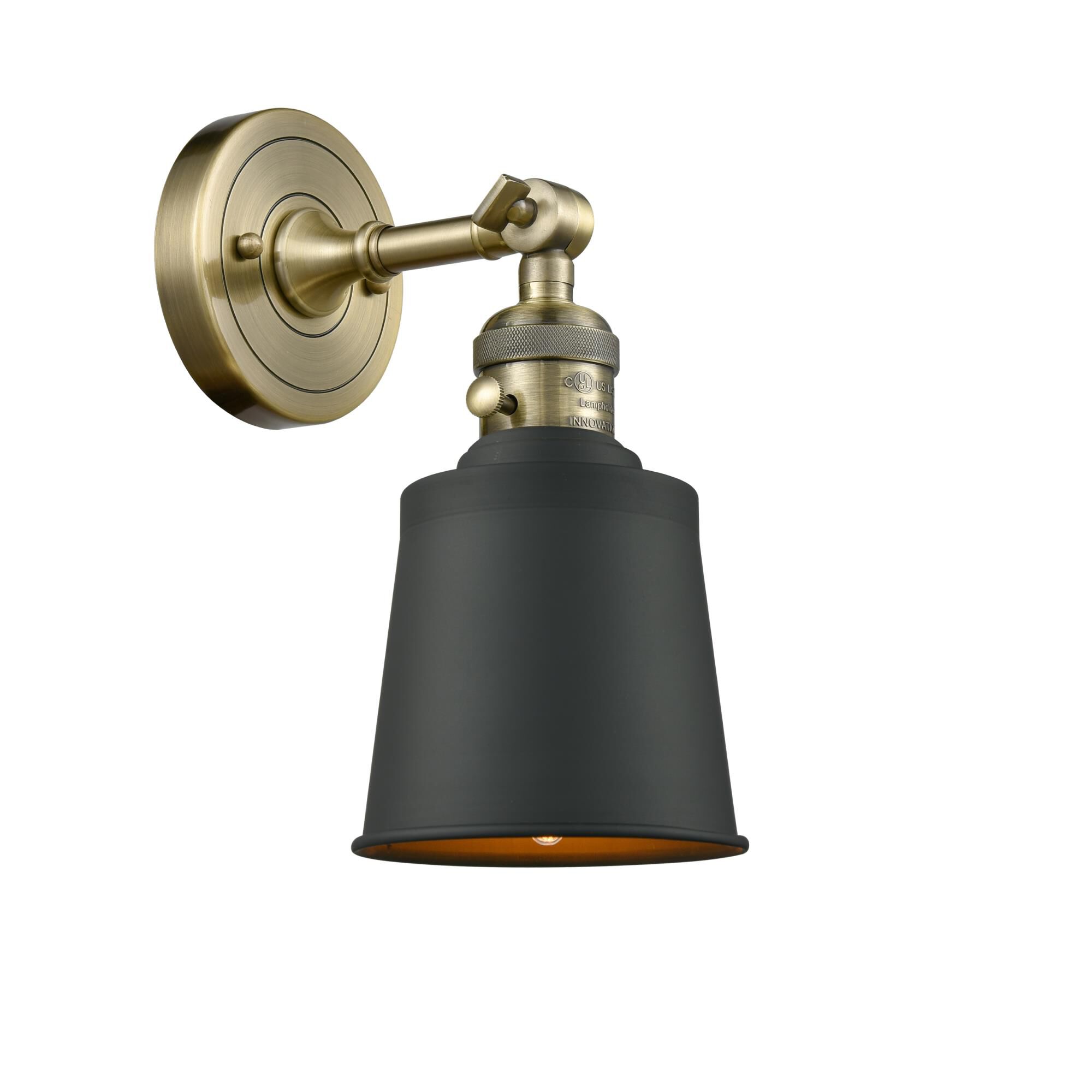 Shown in Antique Brass finish and Antique Brass Addison shade