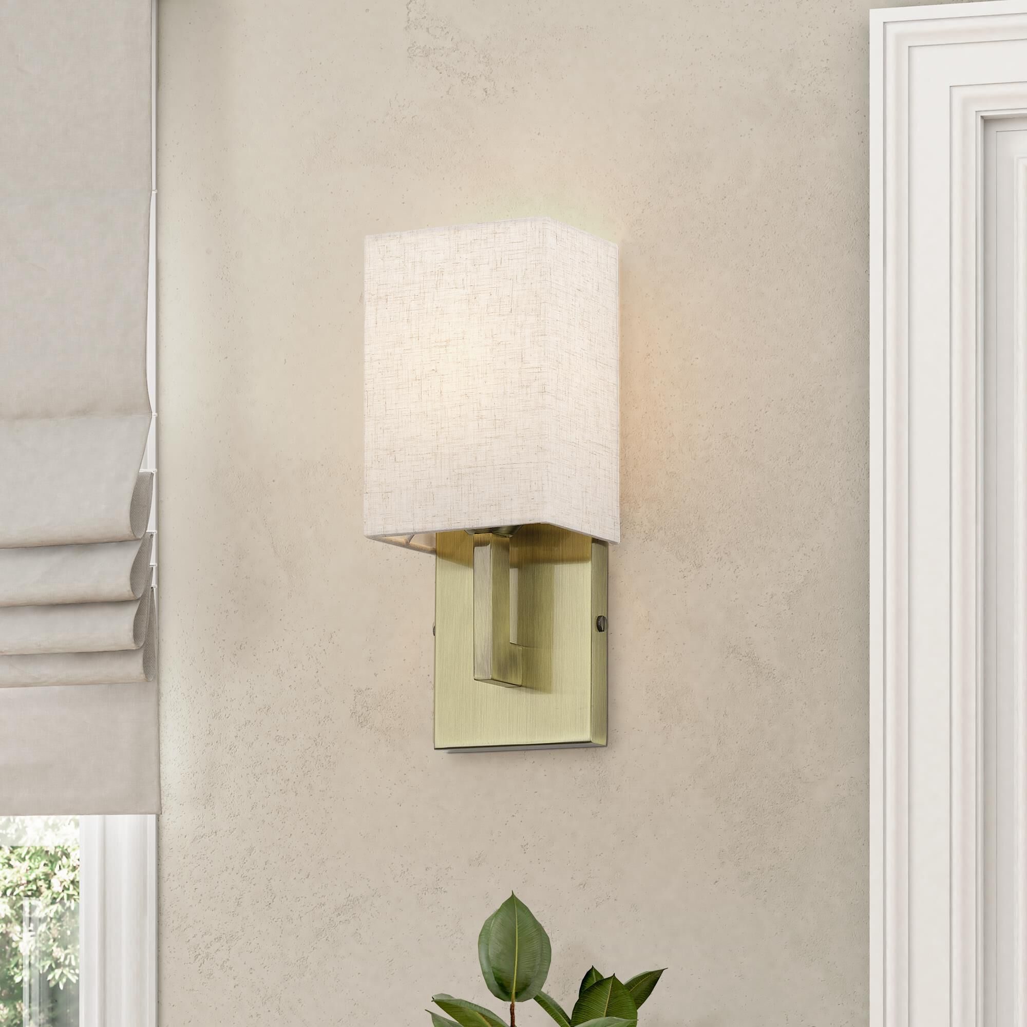 Shown in Antique Brass finish and Hand Crafted Oatmeal Color Fabric with White Color Inside shade
