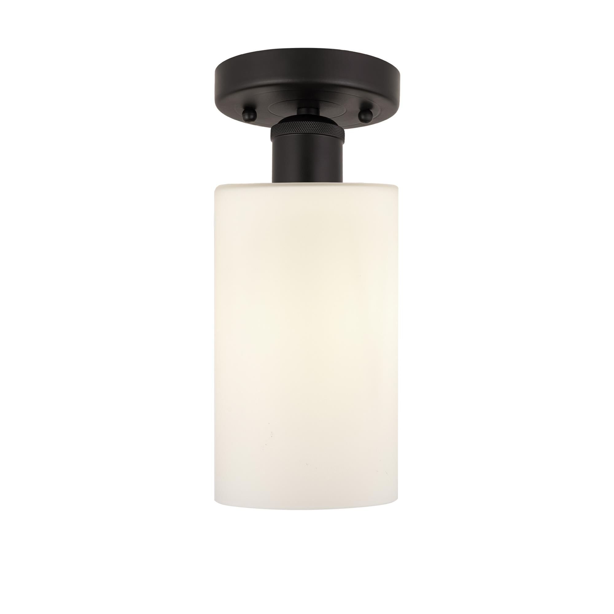 Shown in Oil Rubbed Bronze finish and Matte White glass