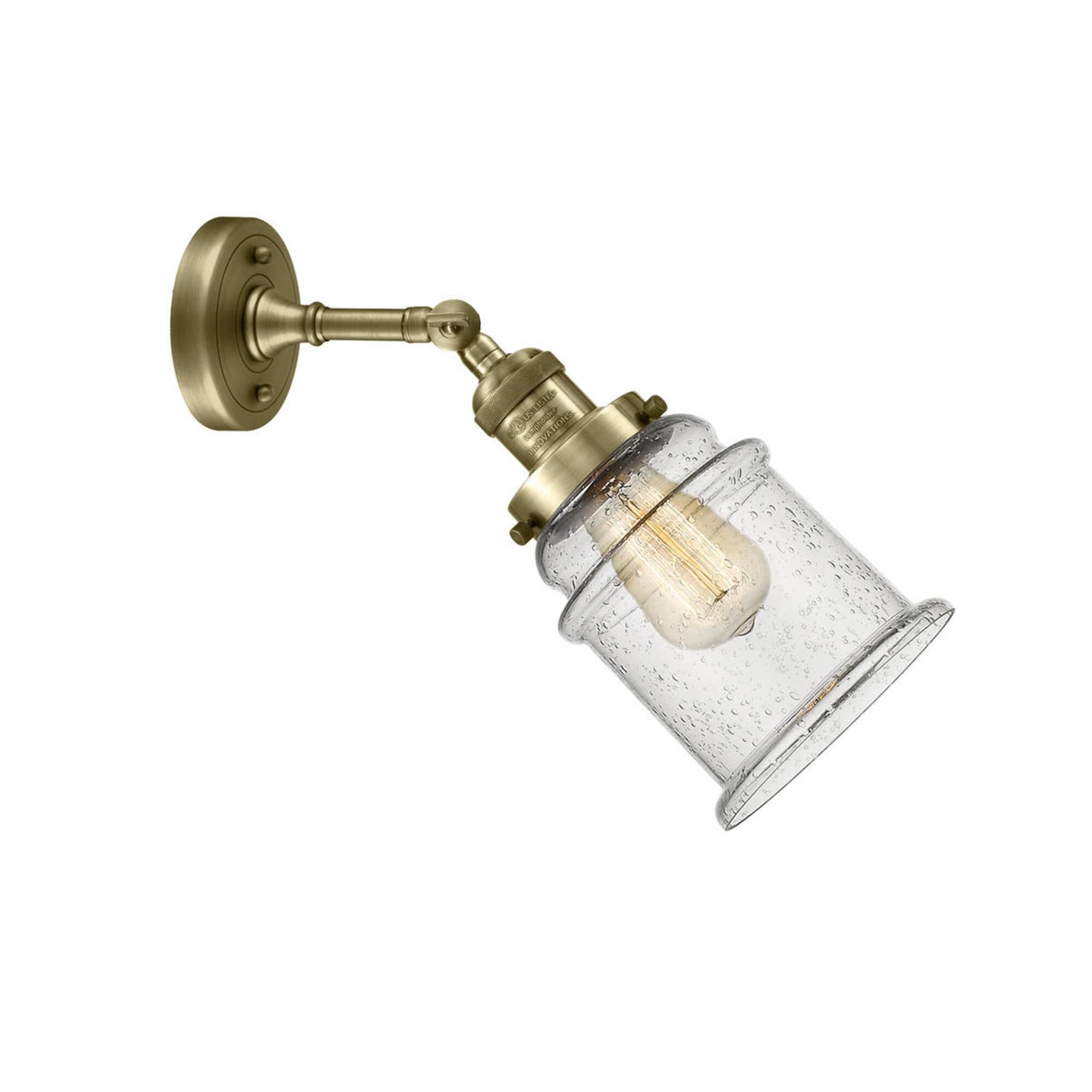 Shown in Antique Brass finish and Seedy glass and No Accent accent