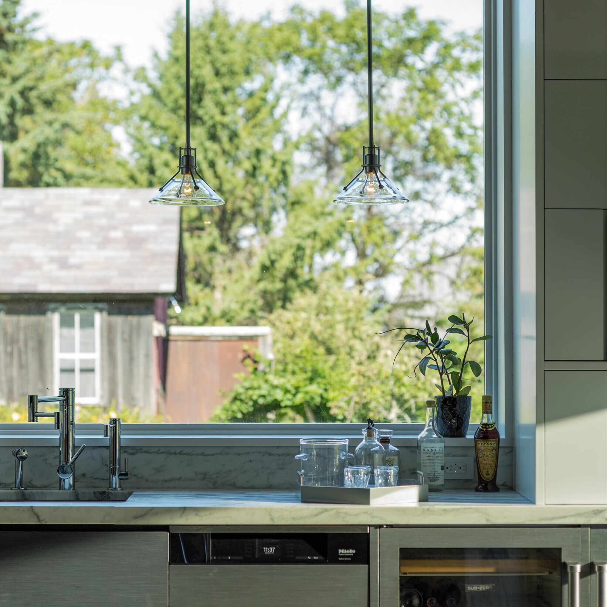 Shown in Dark Smoke finish and Clear glass