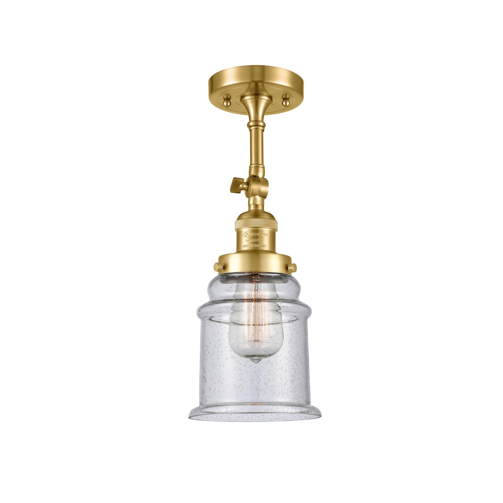 Shown in Satin Gold finish and Seedy glass and None accent