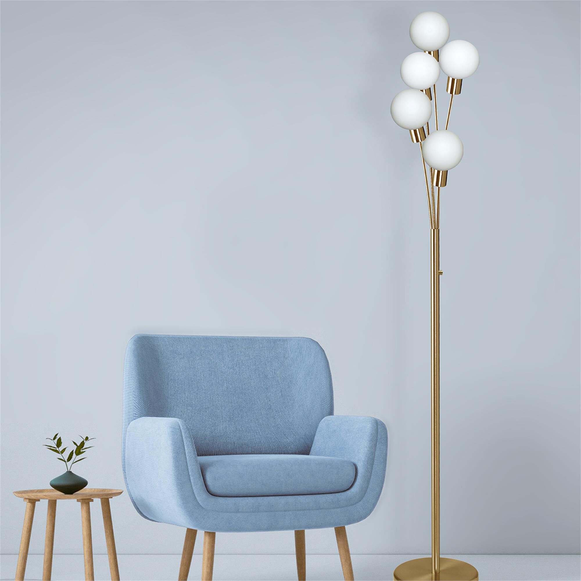 Shown in Aged Brass and White finish and White Globe glass