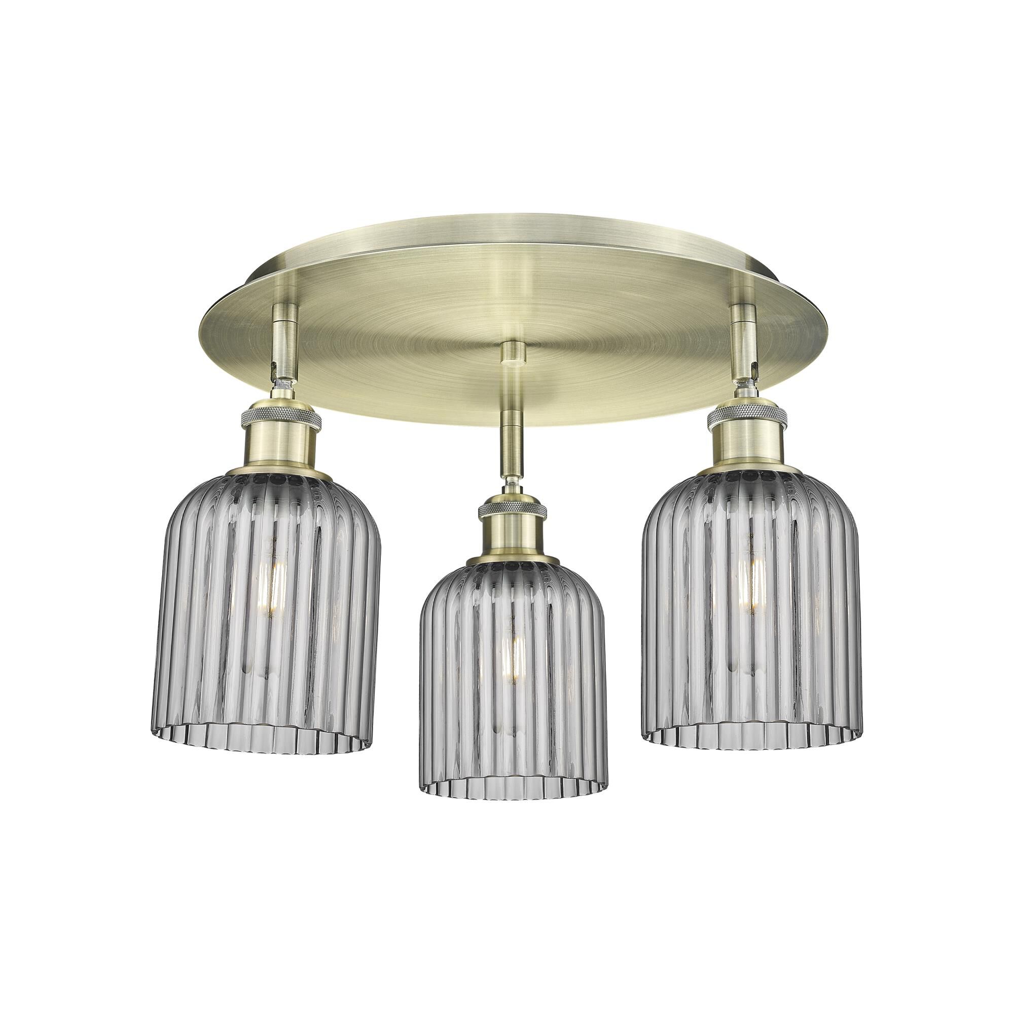 Shown in Antique Brass finish and Light Smoke shade