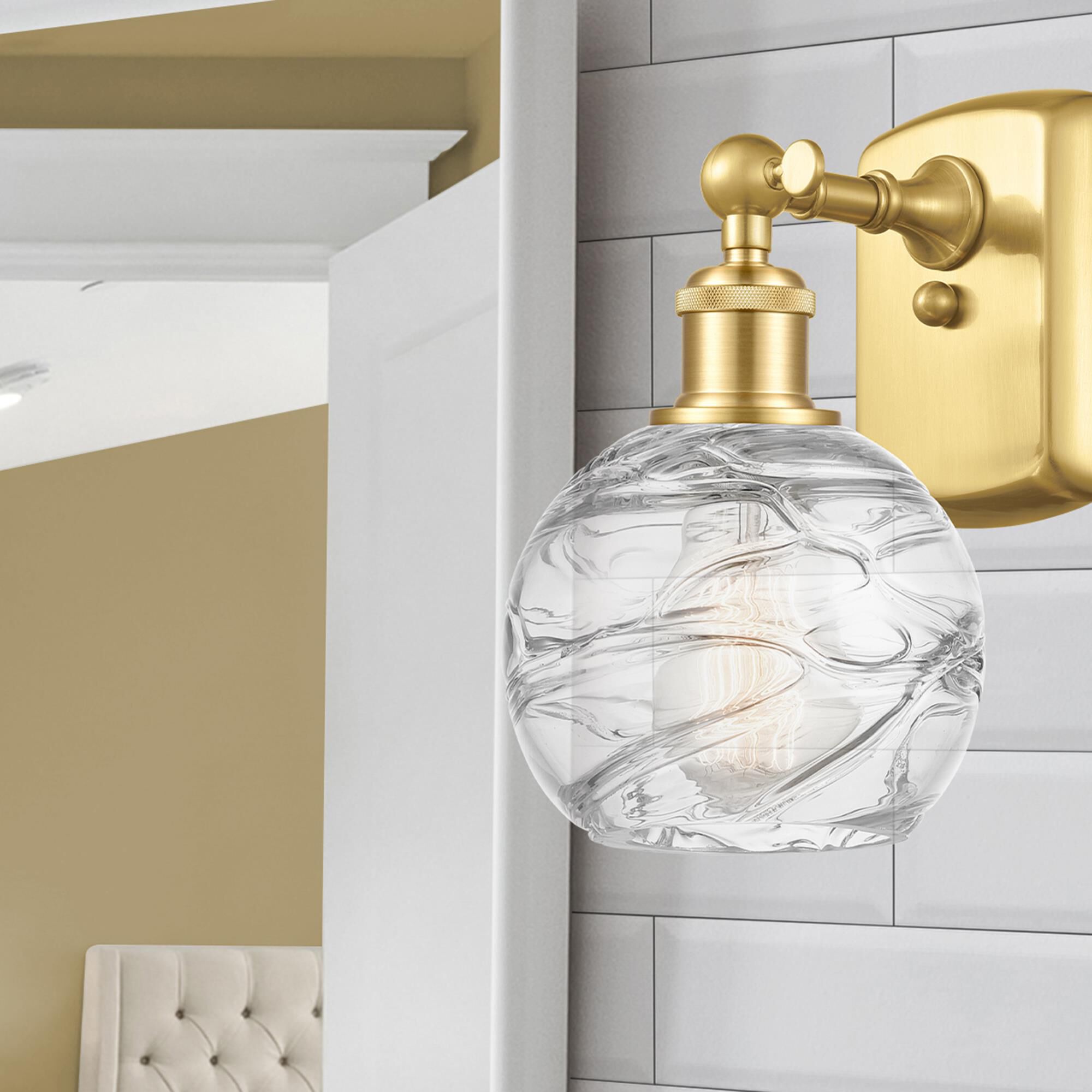 Shown in Satin Gold finish and Clear Small Deco Swirl glass