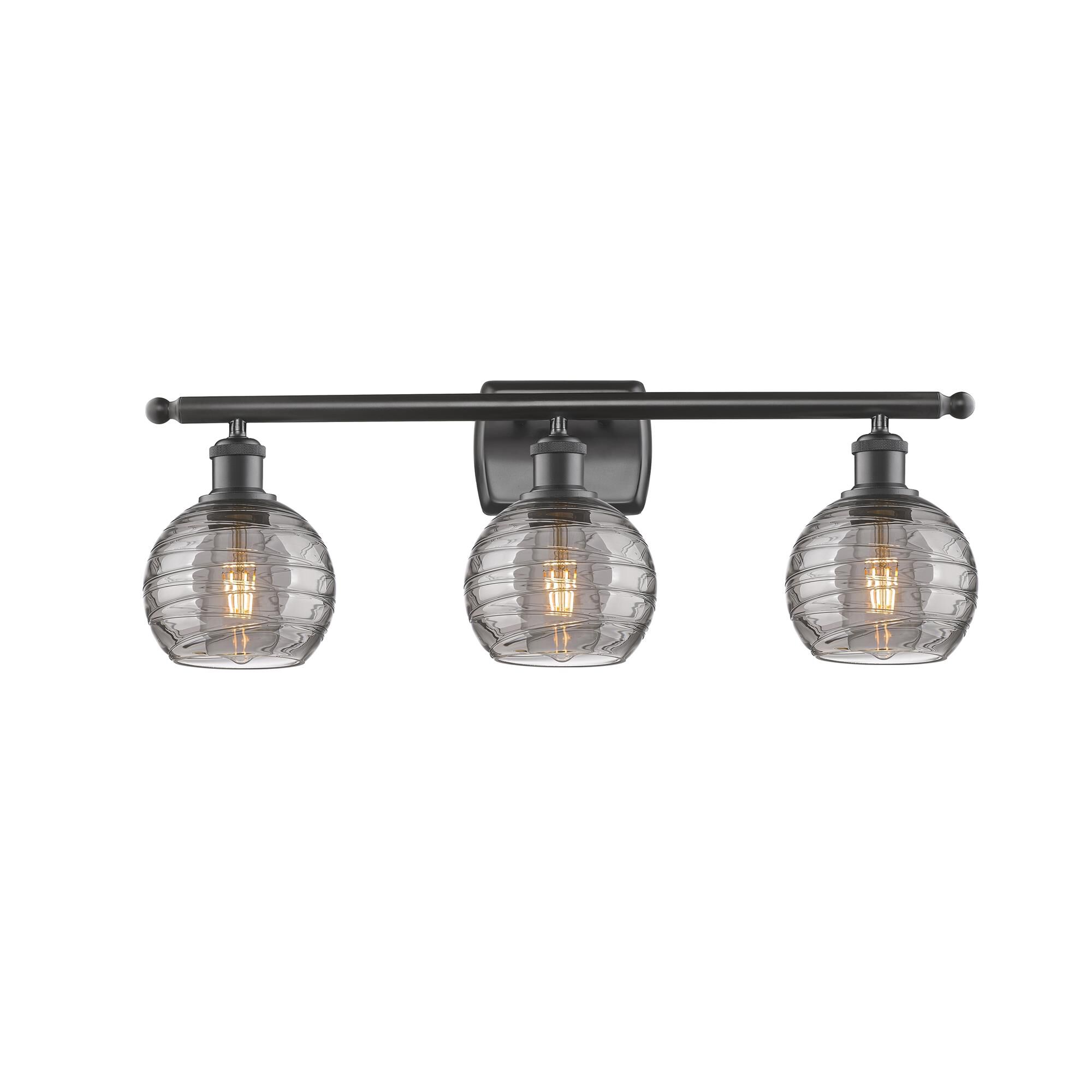 Shown in Oil Rubbed Bronze finish and Light Smoke Deco Swirl glass