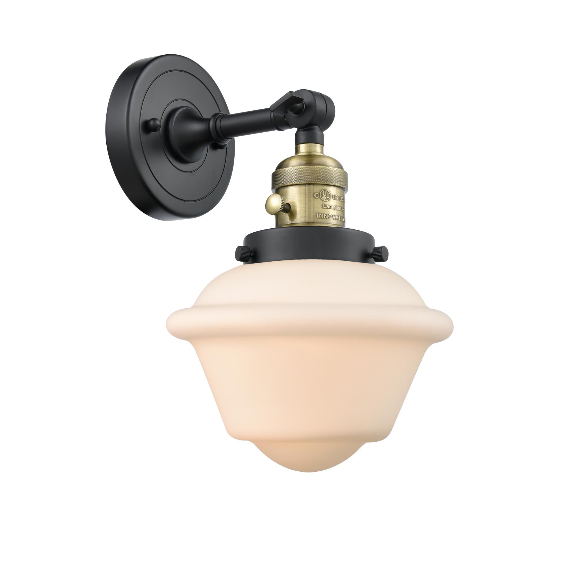 Shown in Black Antique Brass finish and Matte White glass and Switch on Socket accent