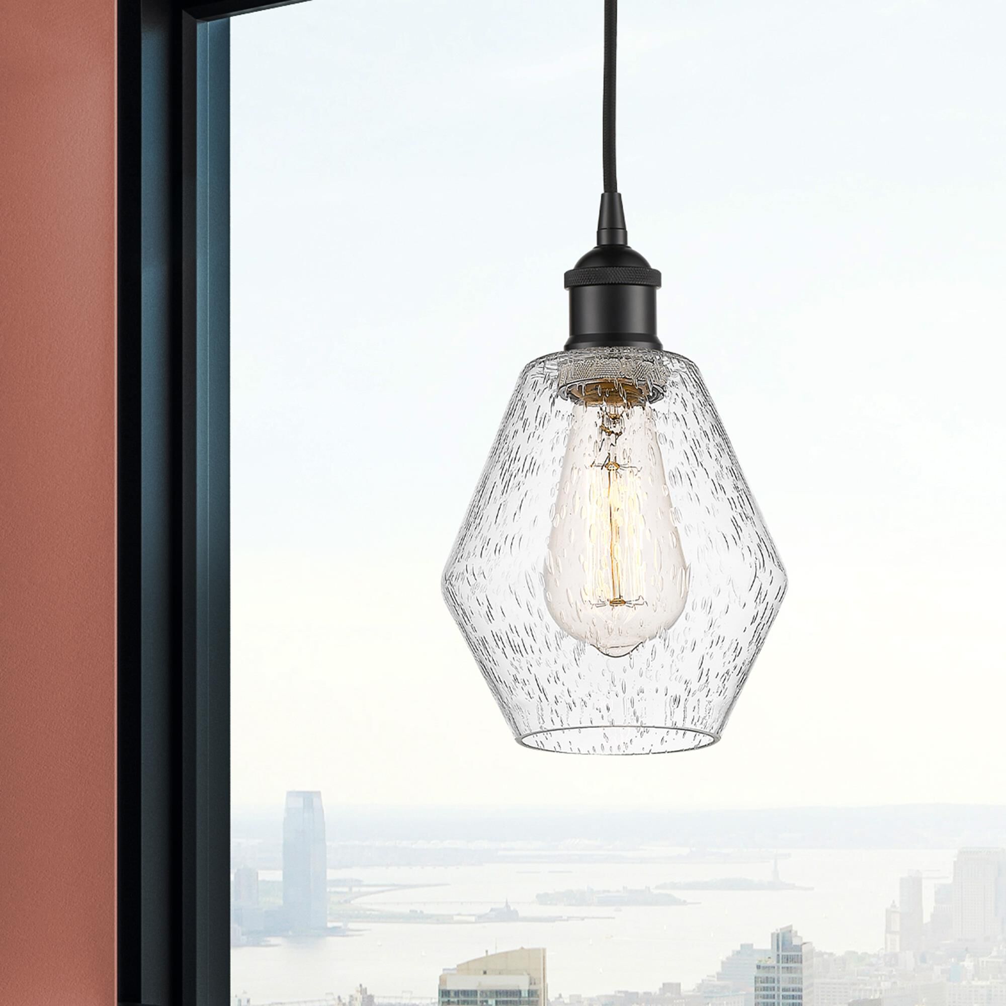 Shown in Matte Black finish and Seedy glass