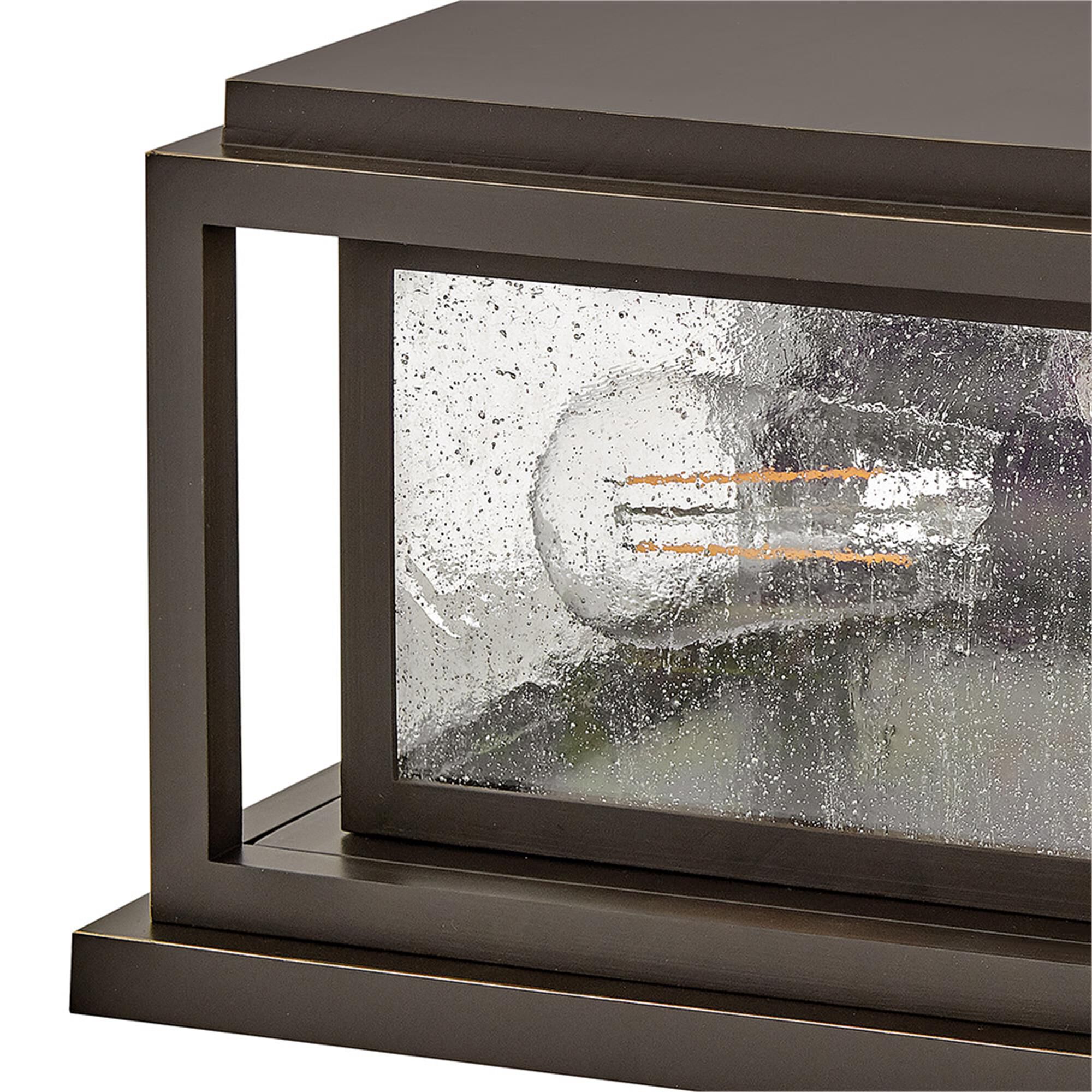 Shown in Oil Rubbed Bronze finish and Clear Seedy glass