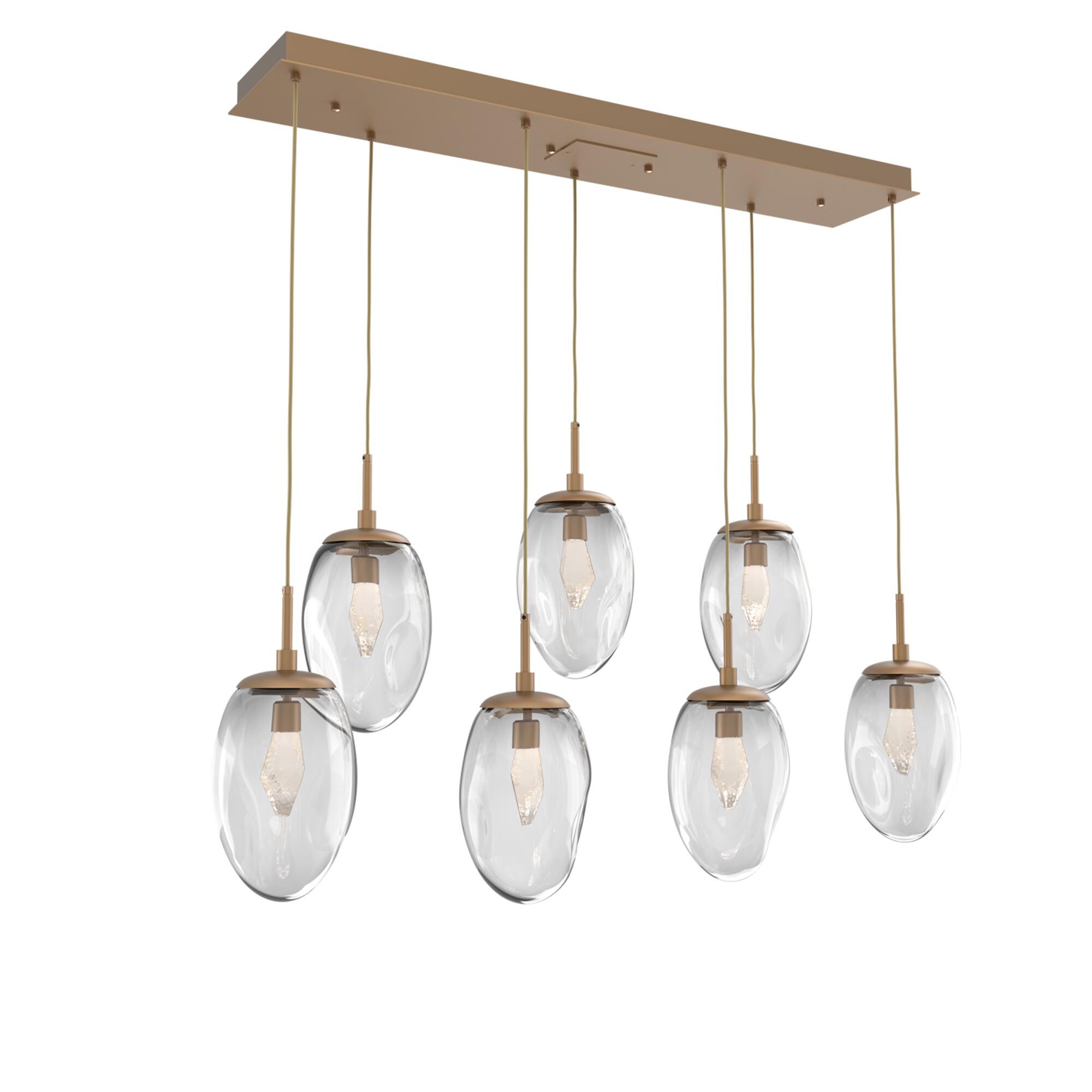 Shown in Novel Brass finish and Geo Inner And Clear Outer glass