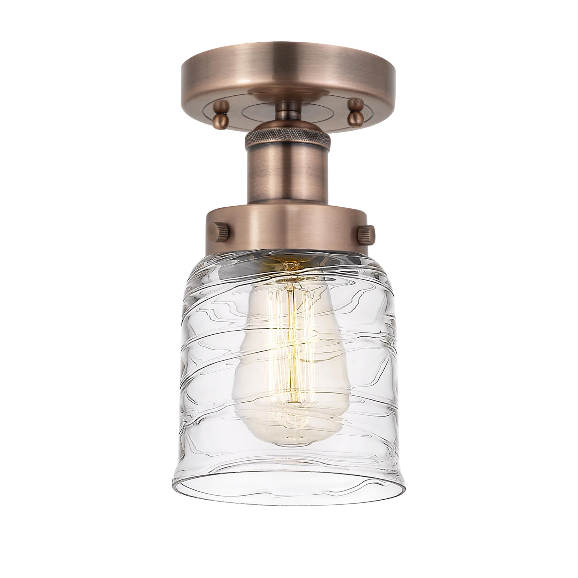 Shown in Antique Copper finish and Clear Deco Swirl glass