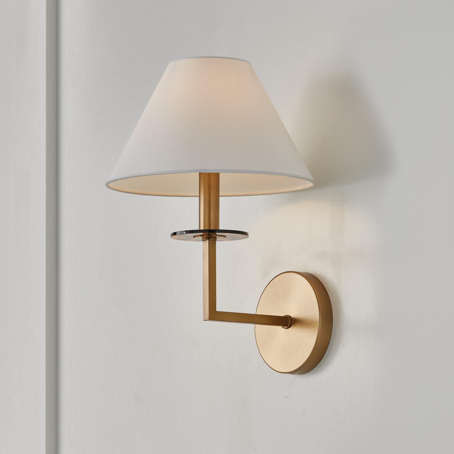 Shown in Aged Brass finish and White Fabric Stay-Straight shade