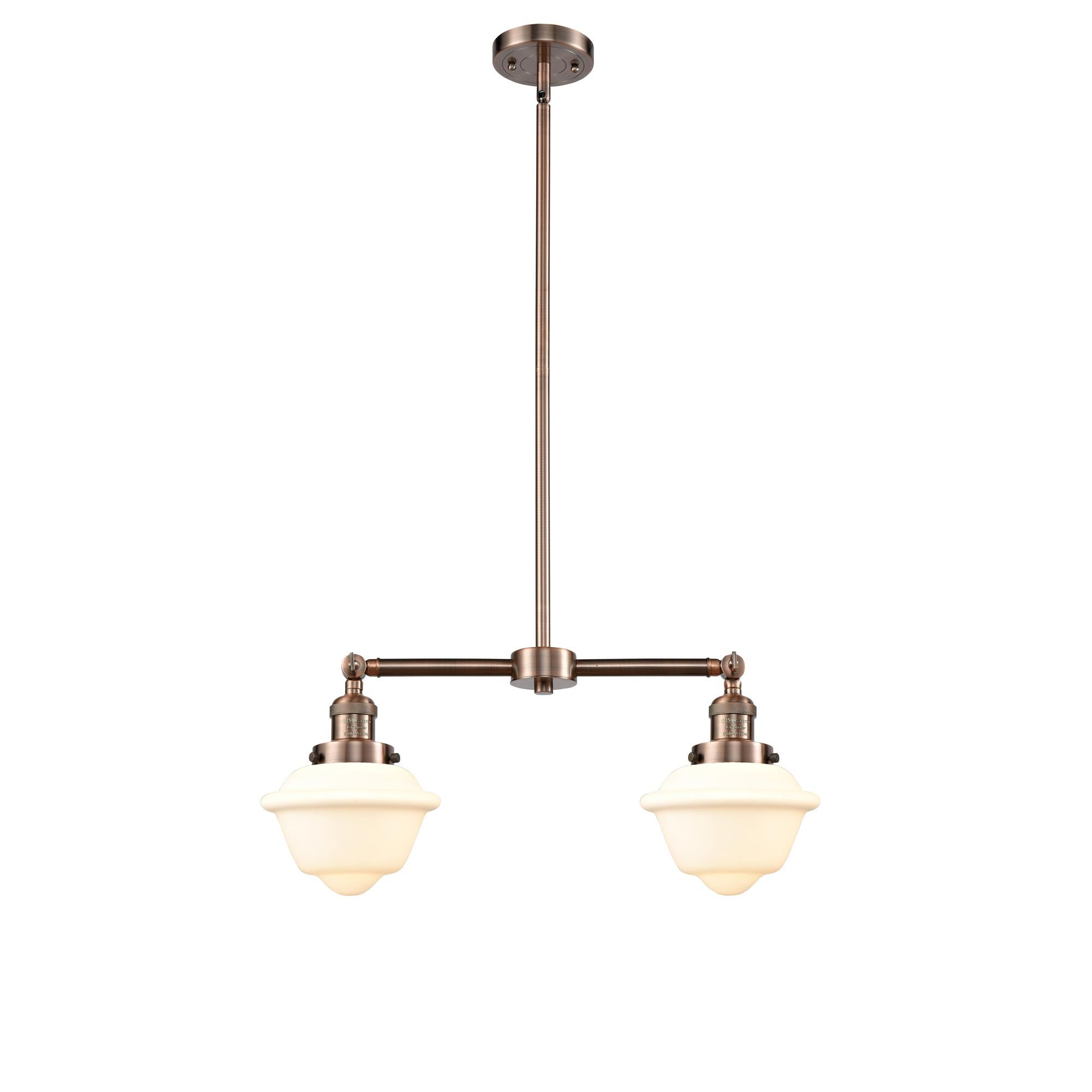 Shown in Antique Copper finish and Matte White Cased glass