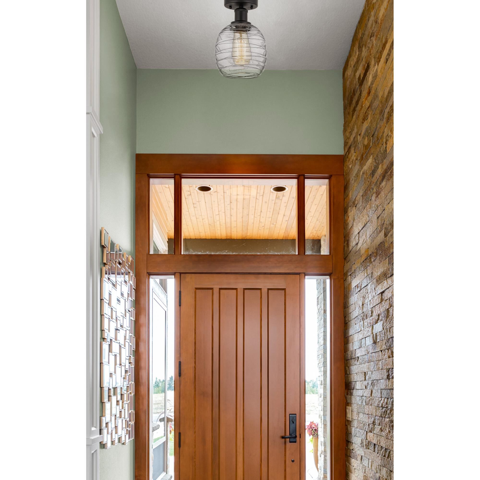 Shown in Oil Rubbed Bronze finish and Deco Swirl glass