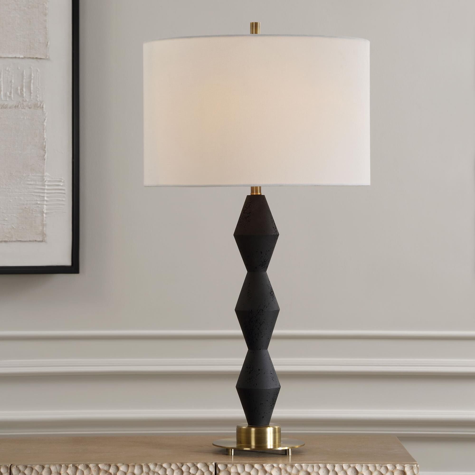 Shown in This Table Lamp Is Crafted From Cast Black Man-Made Stone For A Bold Yet Refined Aesthetic. Its Dist finish and Round Drum Hardback shade