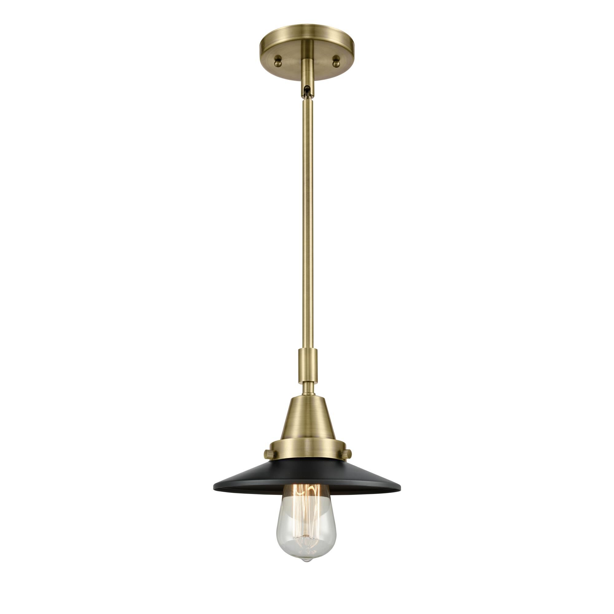 Shown in Antique Brass finish and No Glass glass and Matte Black Railroad shade