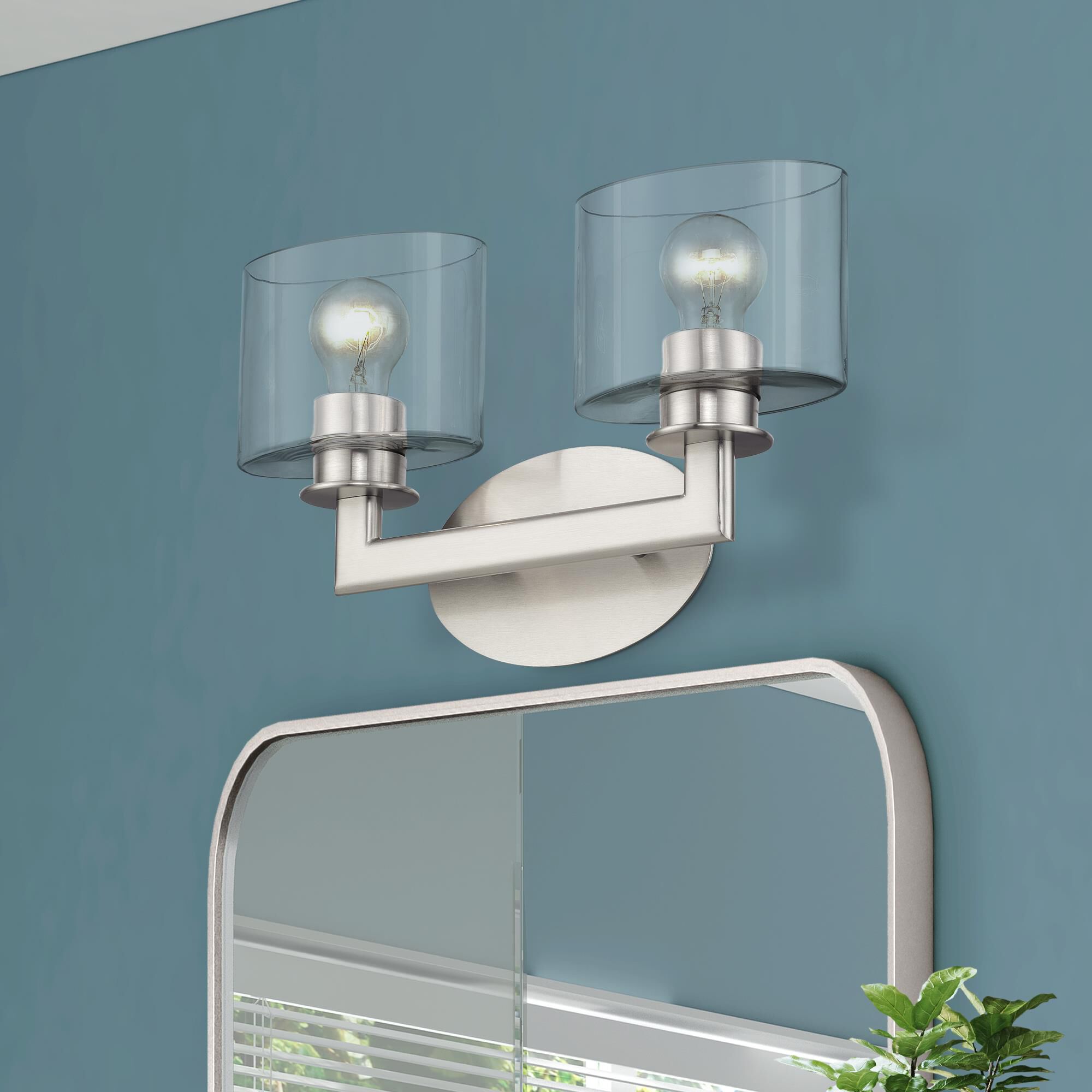 Shown in Brushed Nickel finish and Mouth Blown Clear glass
