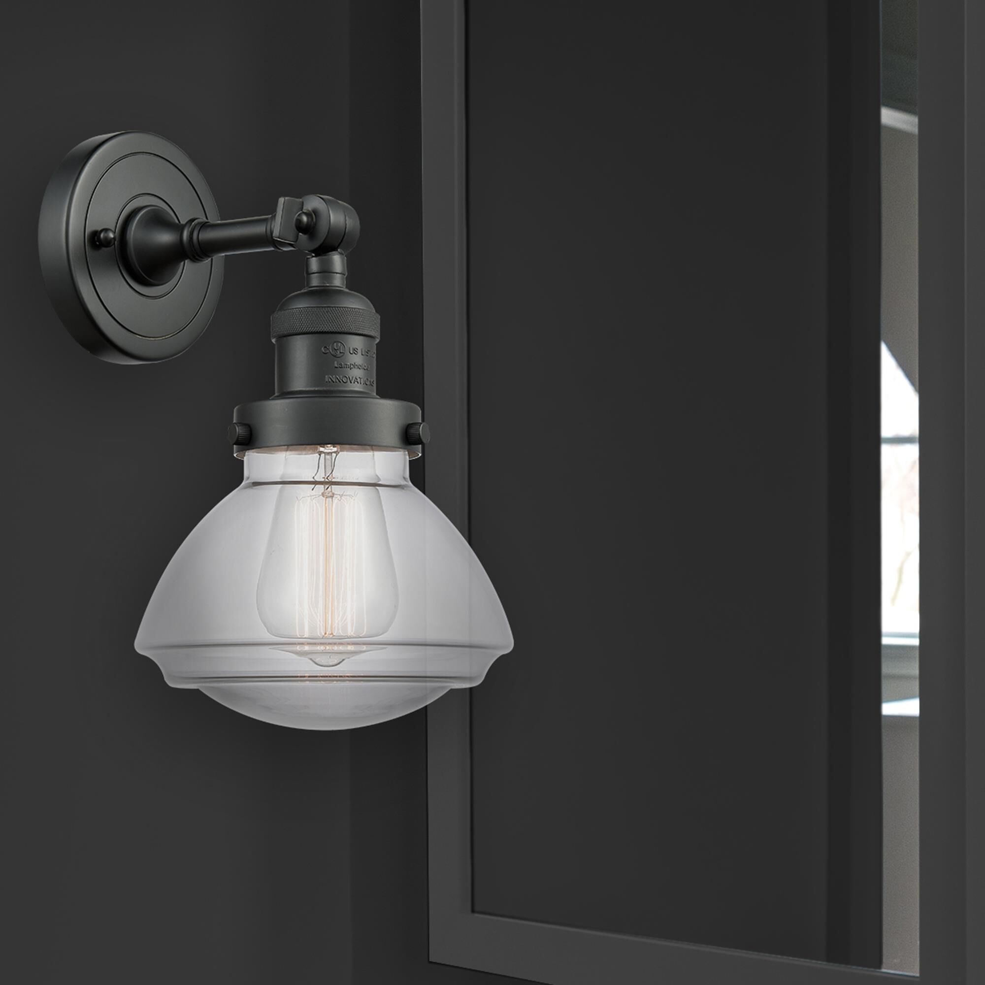 Shown in Matte Black finish and Transparent  Clear Olean glass and Glass shade and Bulb Tint - Amber accent