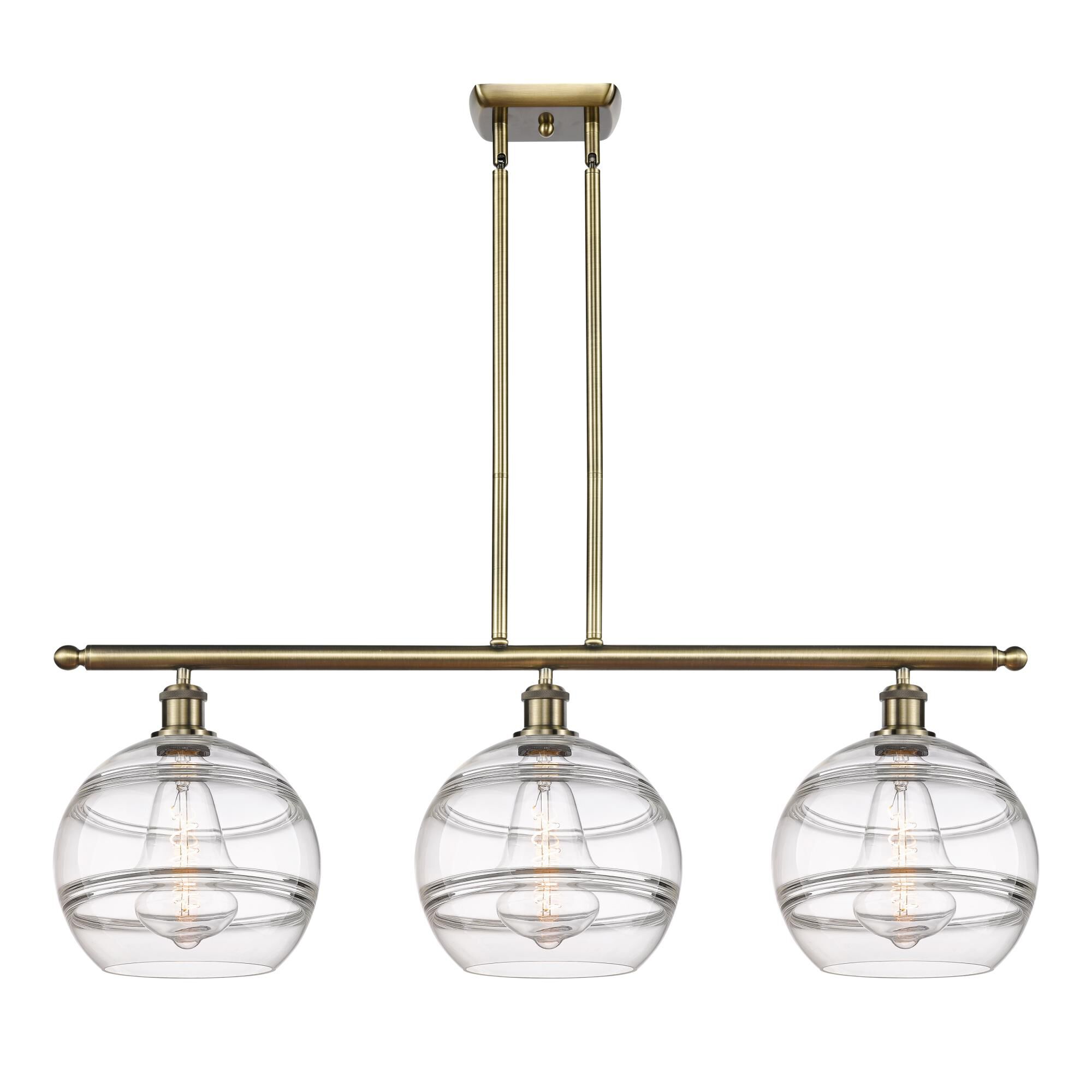 Shown in Antique Brass finish and Clear glass