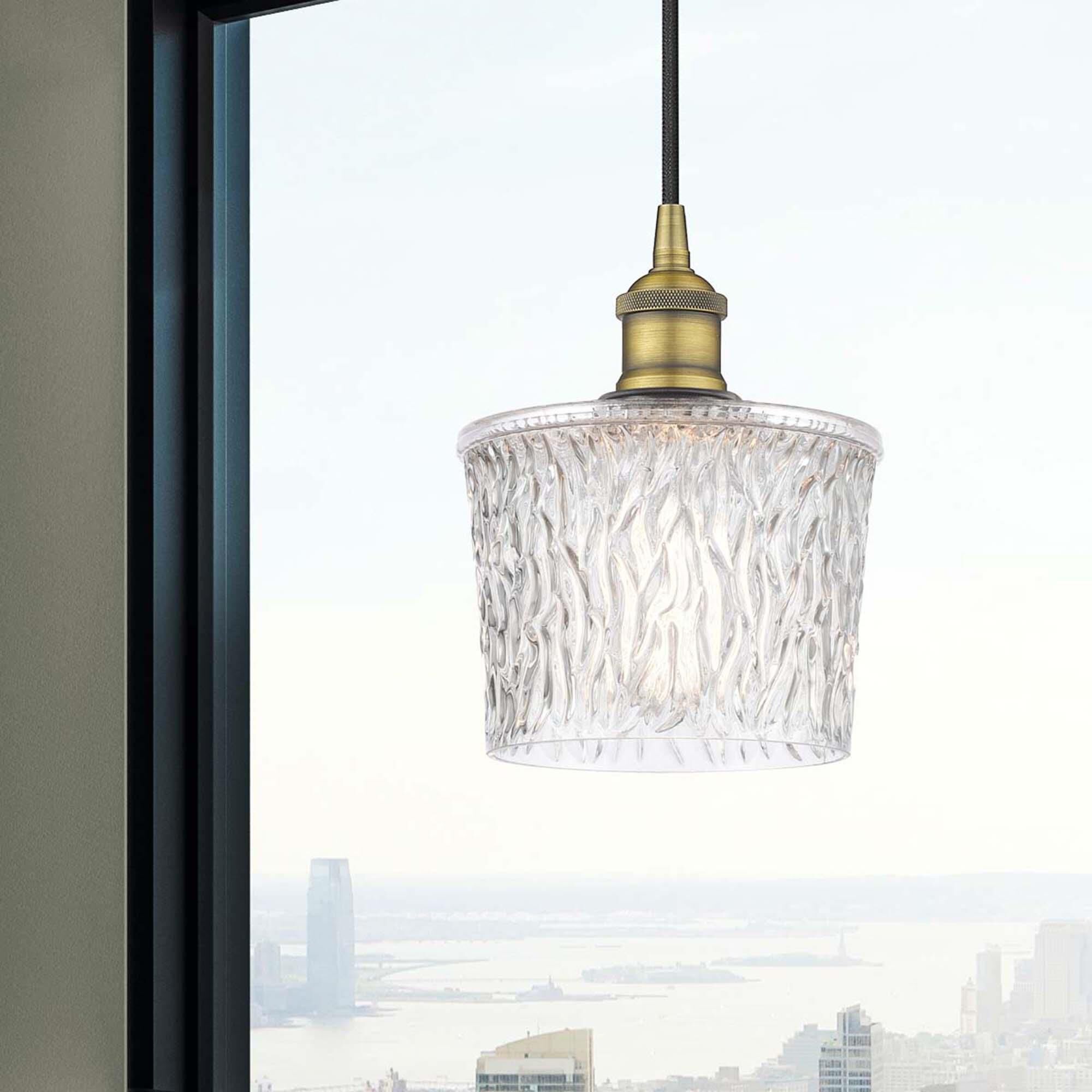 Shown in Brushed Brass finish and Clear glass