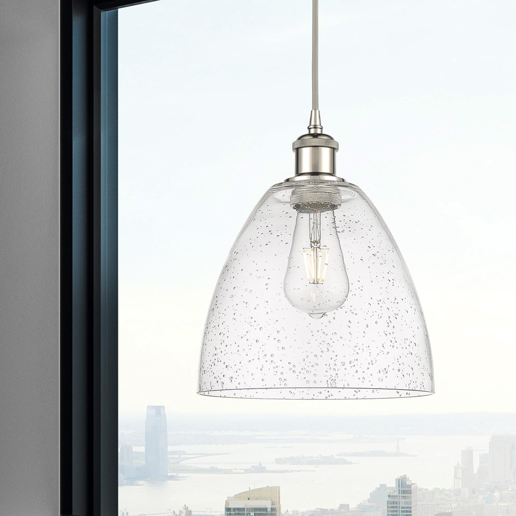 Shown in Polished Nickel finish and Seedy glass