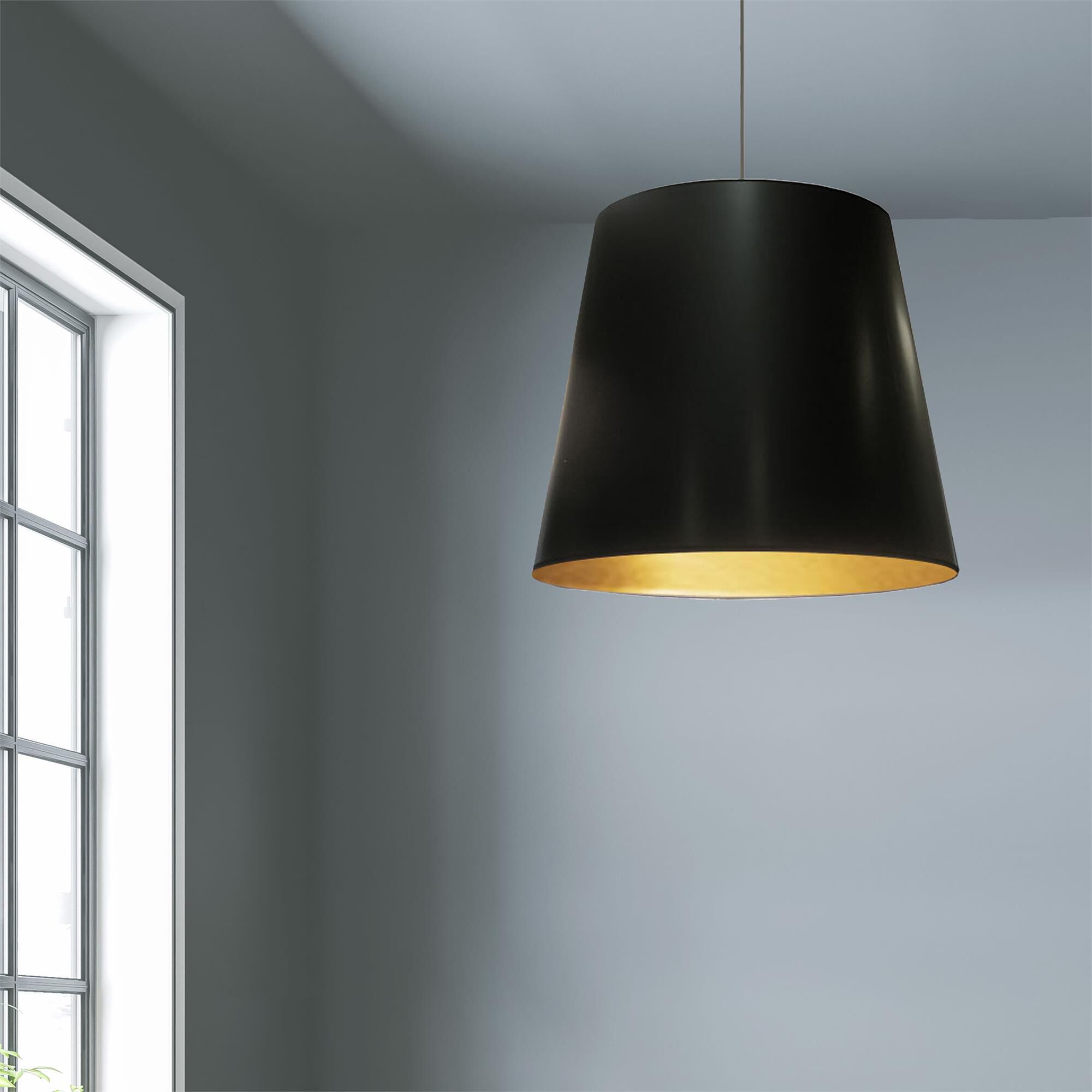Shown in Black finish and Black and Gold Drum shade and Polished Chrome accent