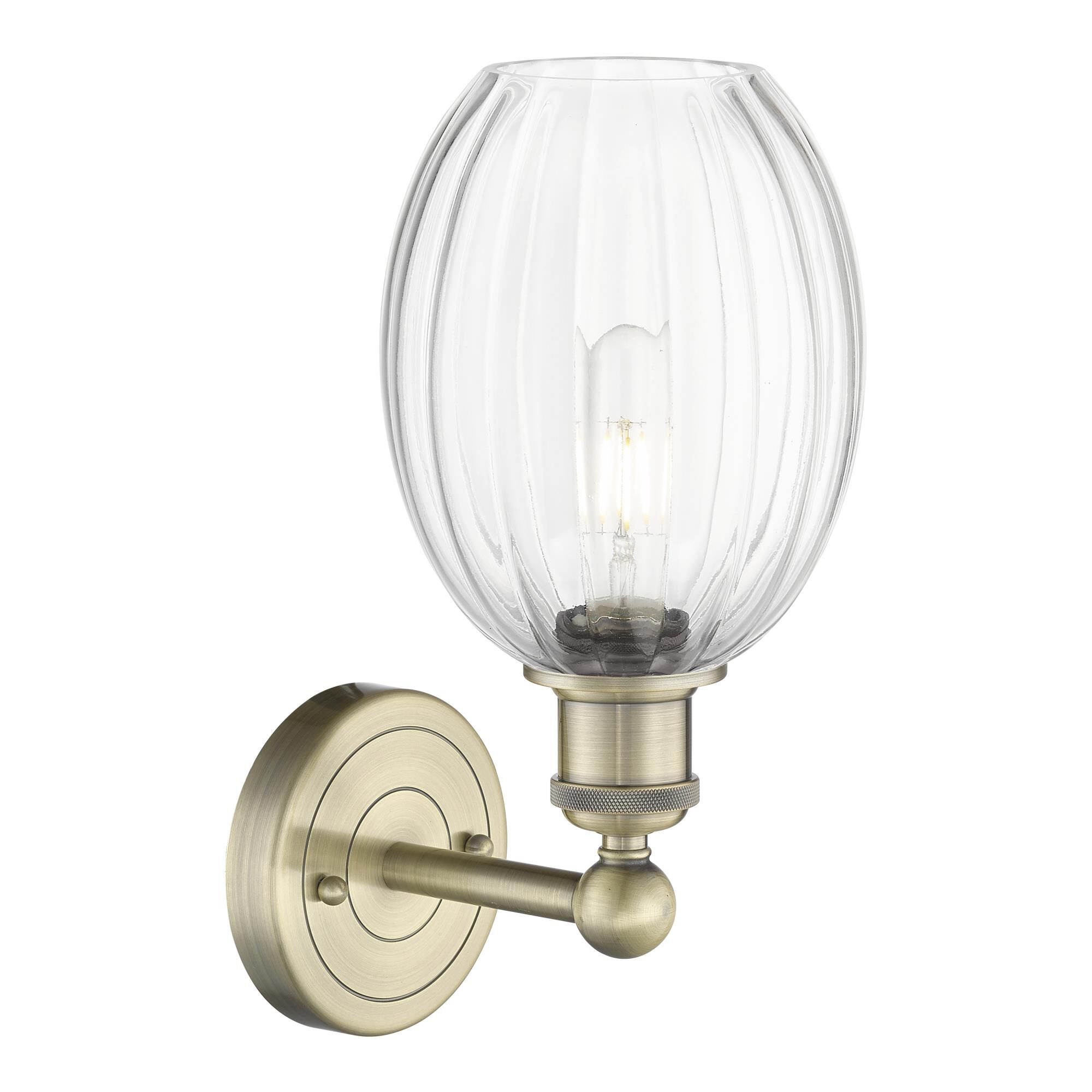 Shown in Antique Brass finish and Clear glass