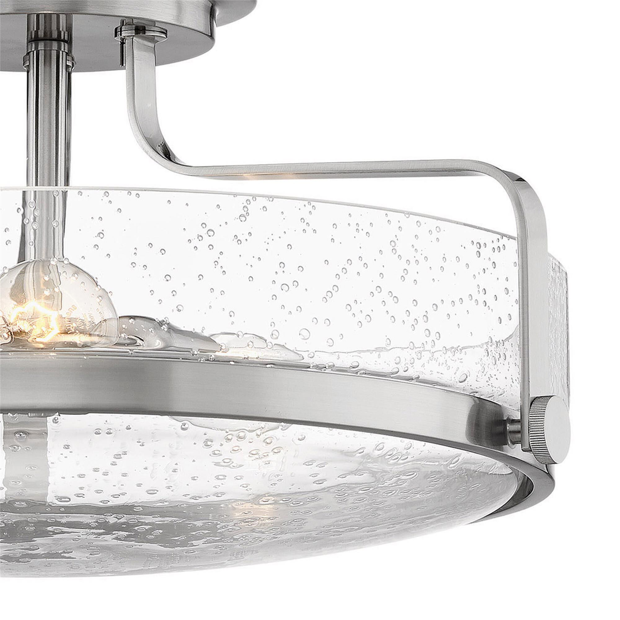Shown in Brushed Nickel finish and Clear Seedy glass