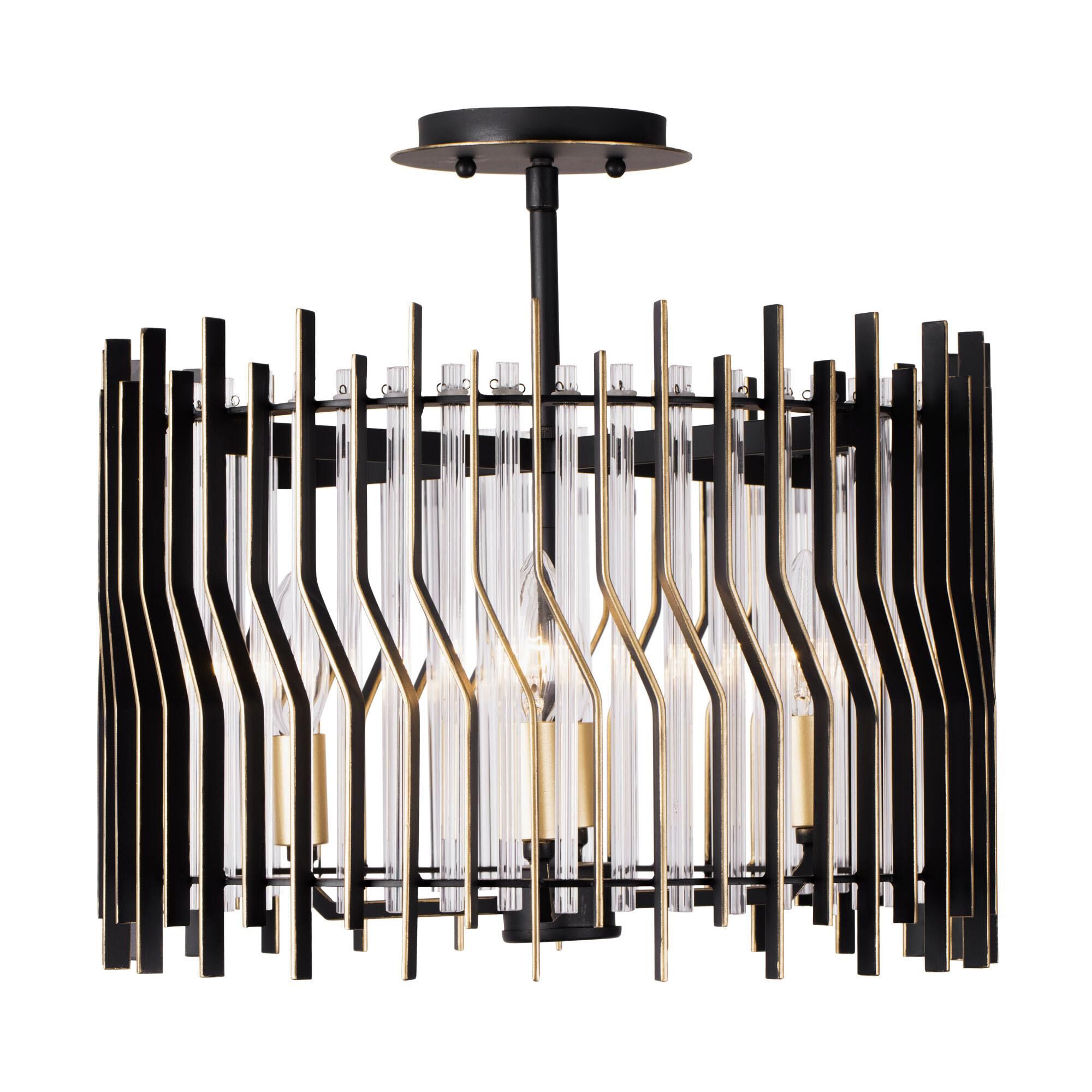 Shown in Matte Black/French Gold finish and Modern Clear Fluted shade