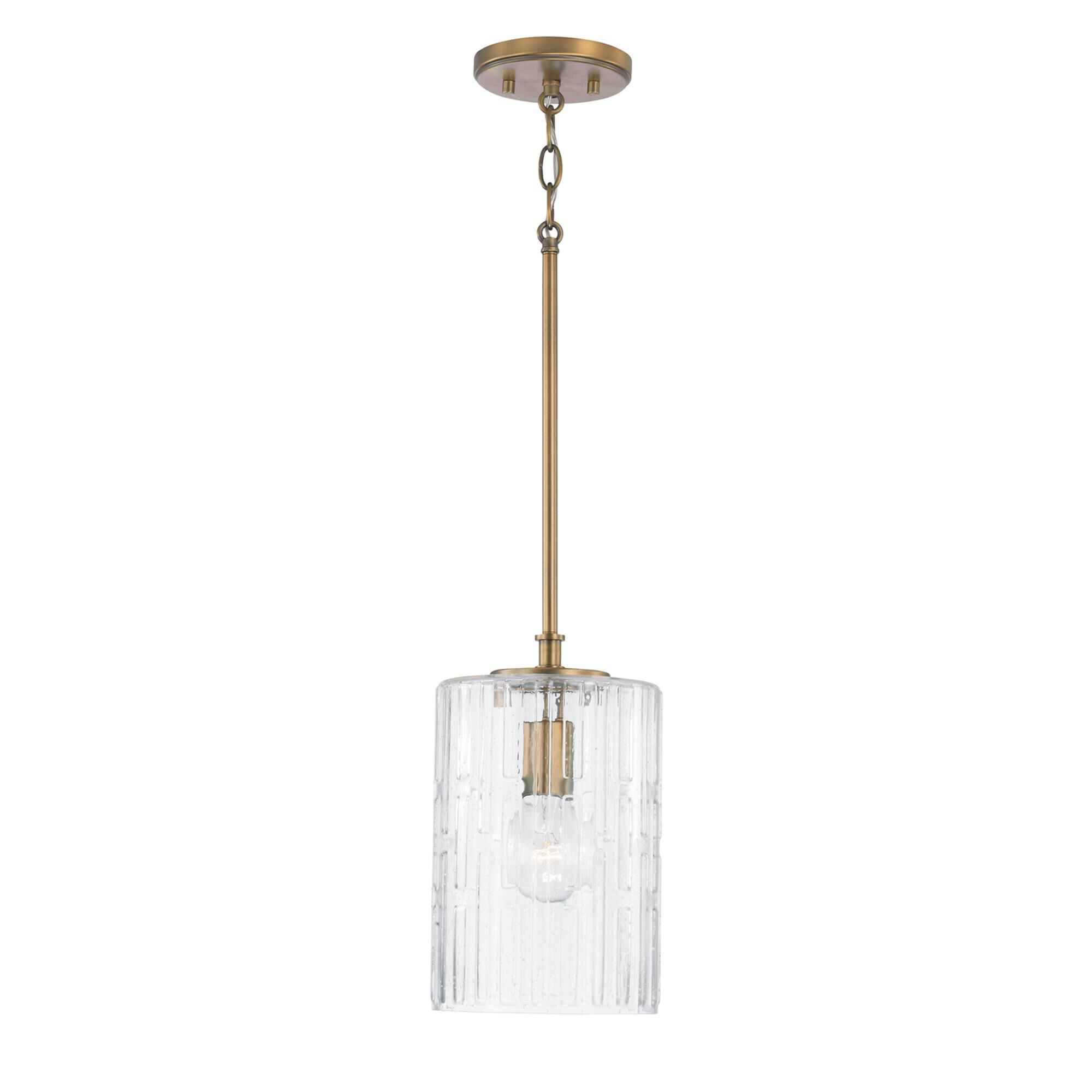 Shown in Aged Brass finish and Embossed Seeded glass