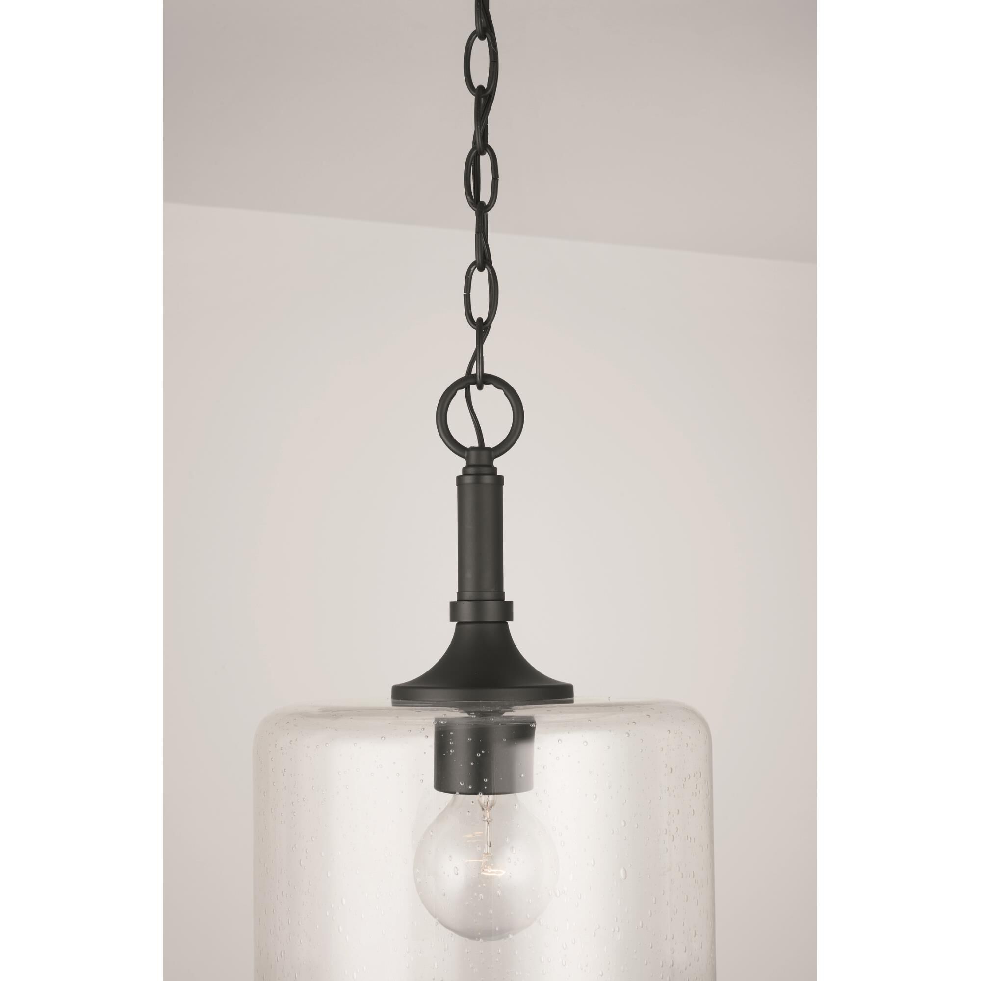 Shown in Matte Black finish and Clear Seeded glass